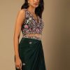 Bottle Green Dhoti Skirt And Choli With Multi Colored Hand Embroidery In Floral Motifs