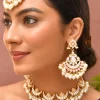 1010-white-kundan-crescent-motif-necklace-set-with-maangtikka-1.webp White Kundan Crescent Motif Necklace Set with Maangtikka