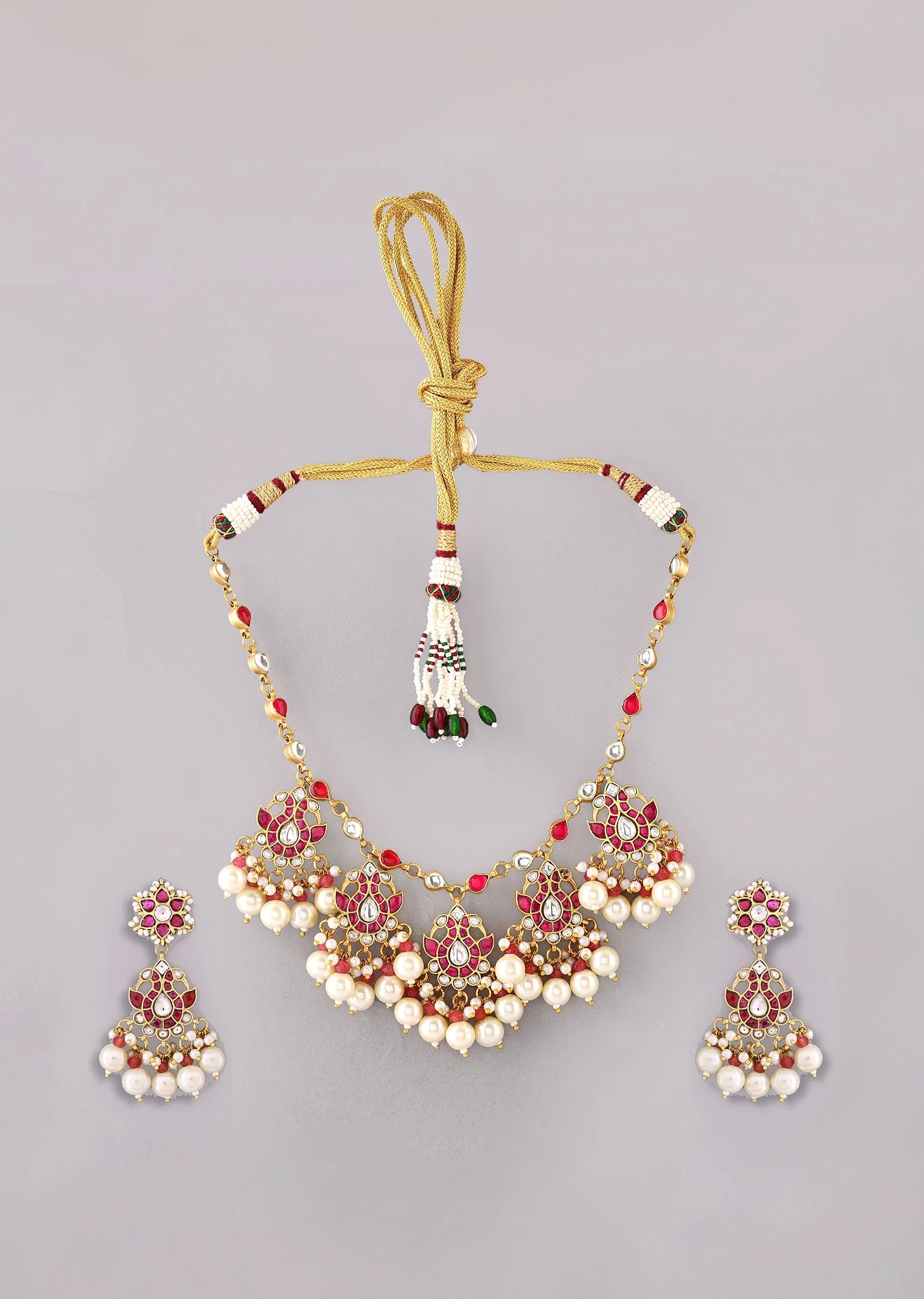 1011-white-kundan-pendant-drop-necklace-and-floral-danglers-set-2.webp White Kundan Pendant Drop Necklace and Floral Danglers Set
