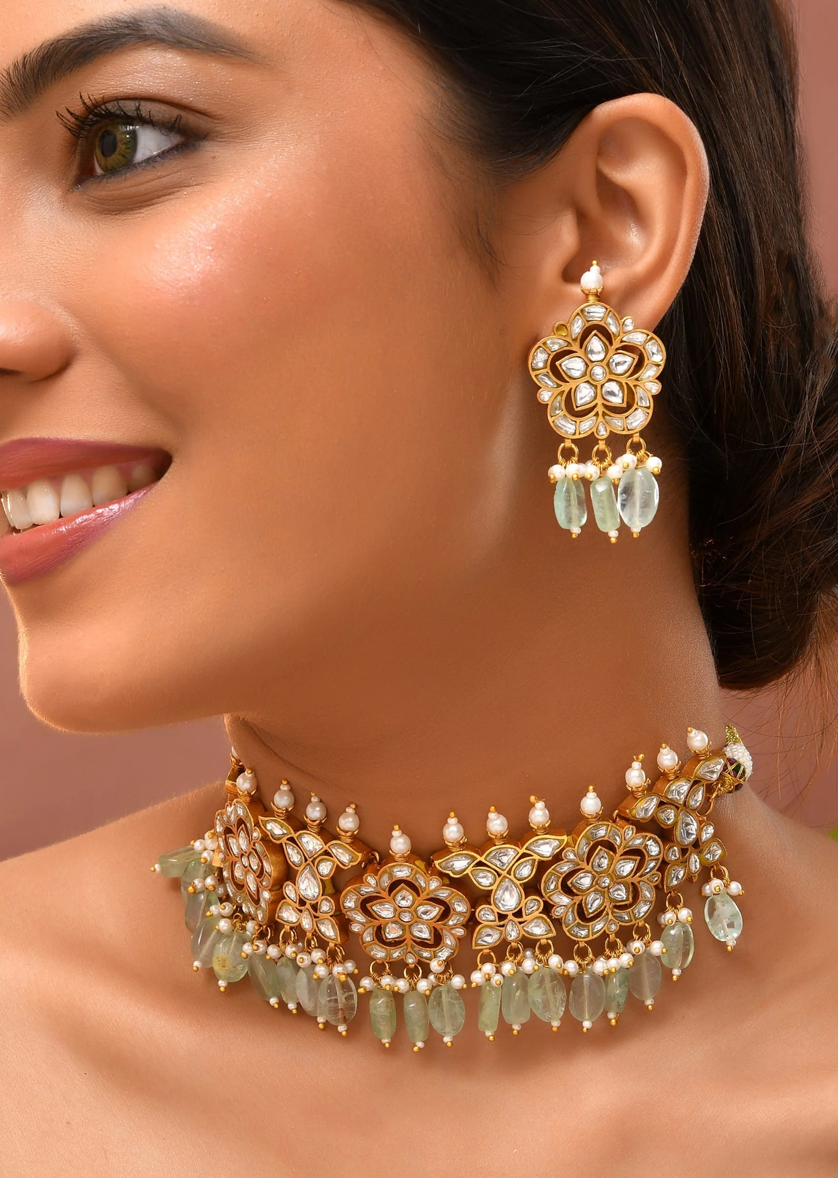 1037-mint-green-kundan-floral-motif-necklace-and-earrings-set-1.webp Mint Green Kundan Floral Motif Necklace and Earrings Set