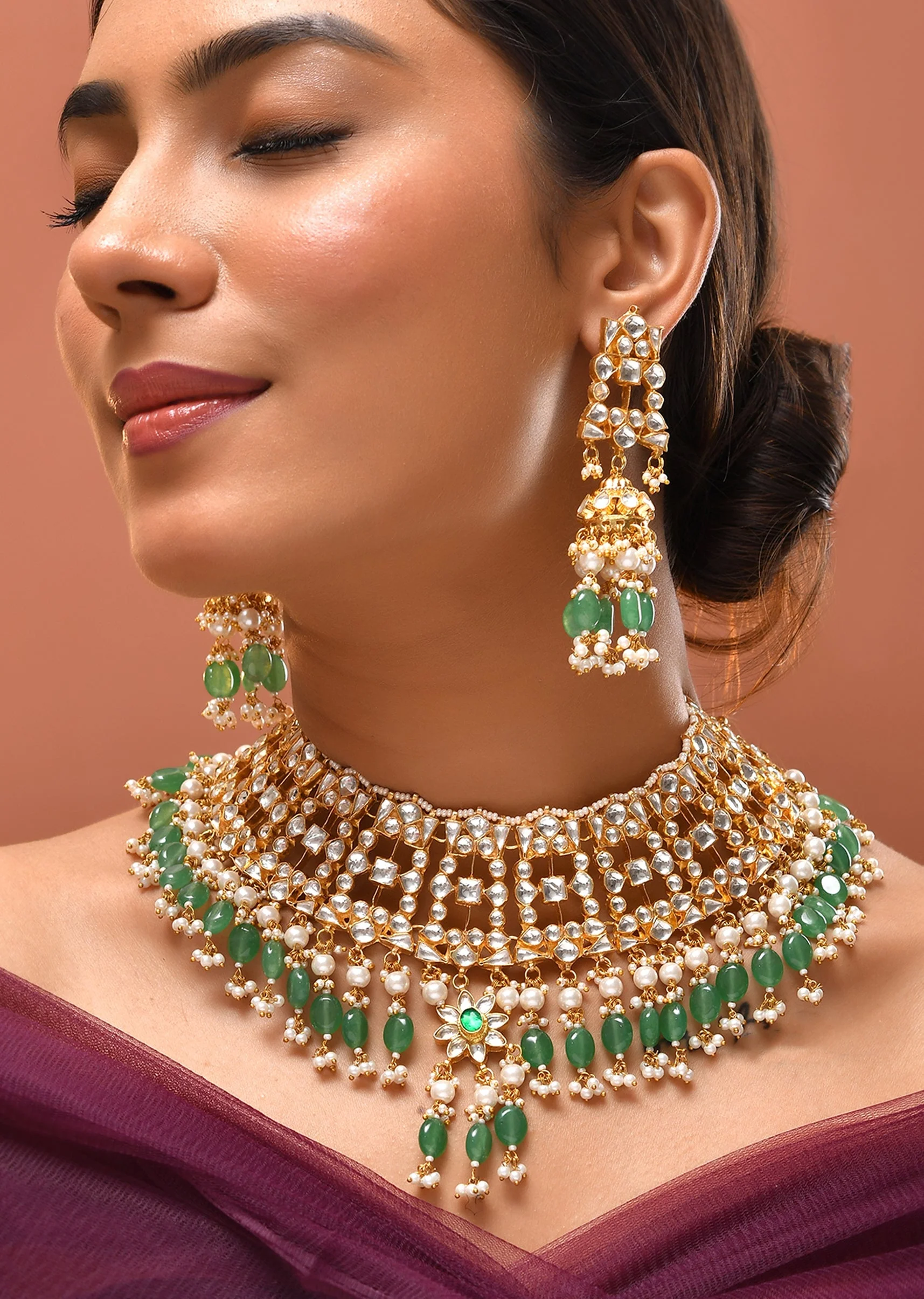 1048-gold-and-green-kundan-necklace-and-earrings-set-1.webp Gold and Green Kundan Necklace and Earrings Set