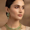 1063-gold-finish-necklace-set-in-kundan-polki-and-meenakari-detailing-1.webp Gold Finish Necklace Set in Kundan Polki and Meenakari Detailing
