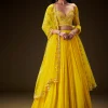 Radiant Yellow Georgette Lehenga With Mirror Work Blouse And Dupatta