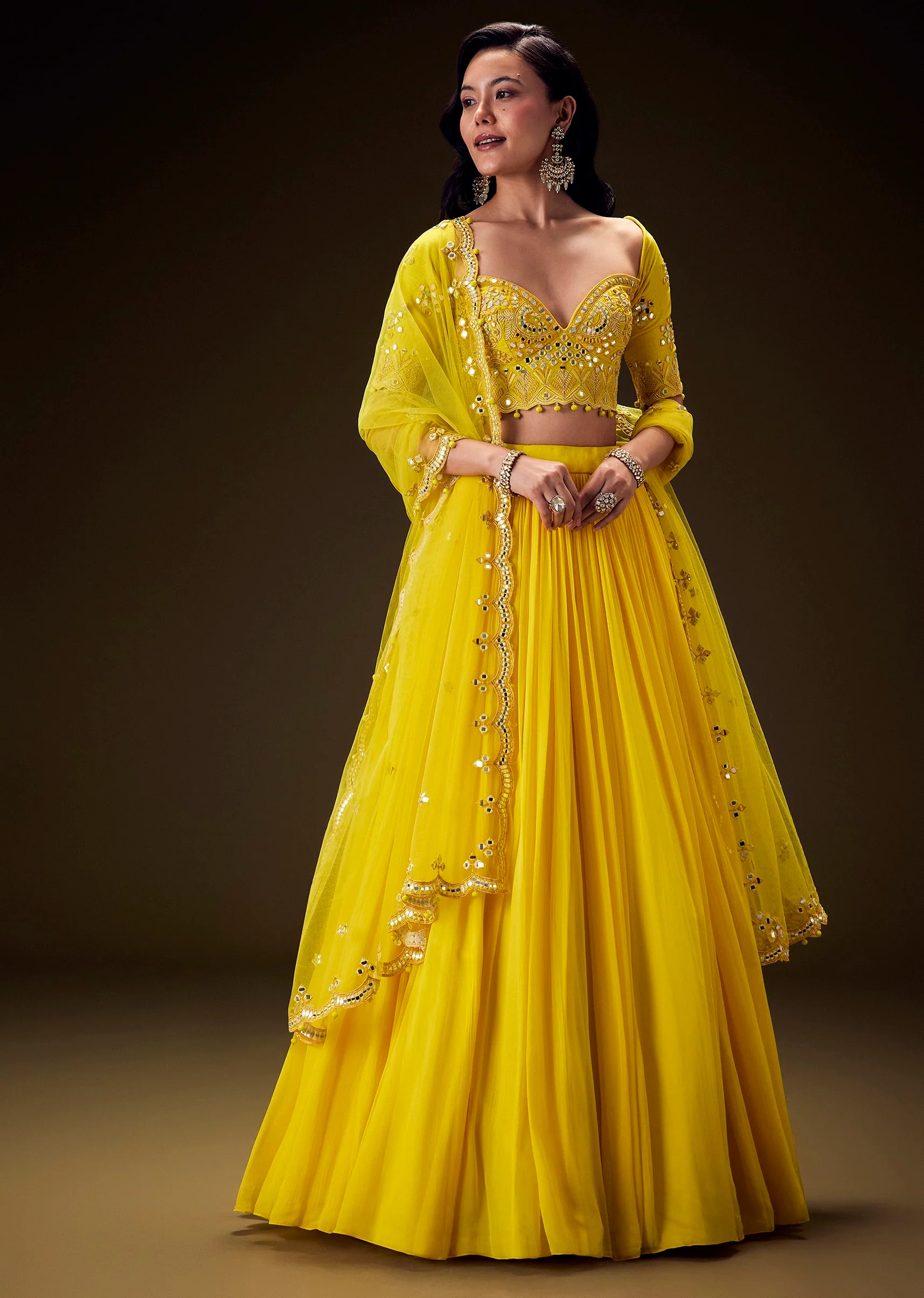 10843-radiant-yellow-georgette-lehenga-with-mirror-work-blouse-and-dupatta-1.webp Radiant Yellow Georgette Lehenga With Mirror Work Blouse And Dupatta