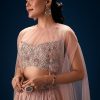 11043-peach-ruched-lehenga-with-embroidered-blouse-and-net-cape-4.jpg Peach Ruched Lehenga With Embroidered Blouse and Net Cape