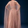 11043-peach-ruched-lehenga-with-embroidered-blouse-and-net-cape-5.webp Peach Ruched Lehenga With Embroidered Blouse and Net Cape