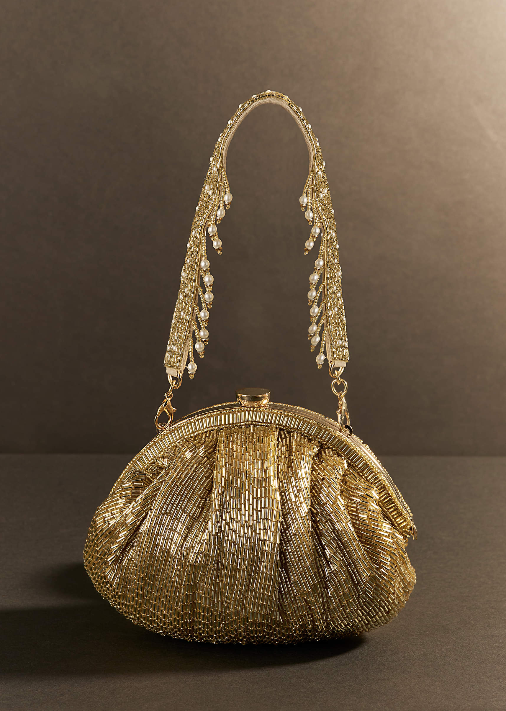 11075-champagne-gold-potli-with-sequin-work-1.jpg Champagne Gold Potli With Sequin Work