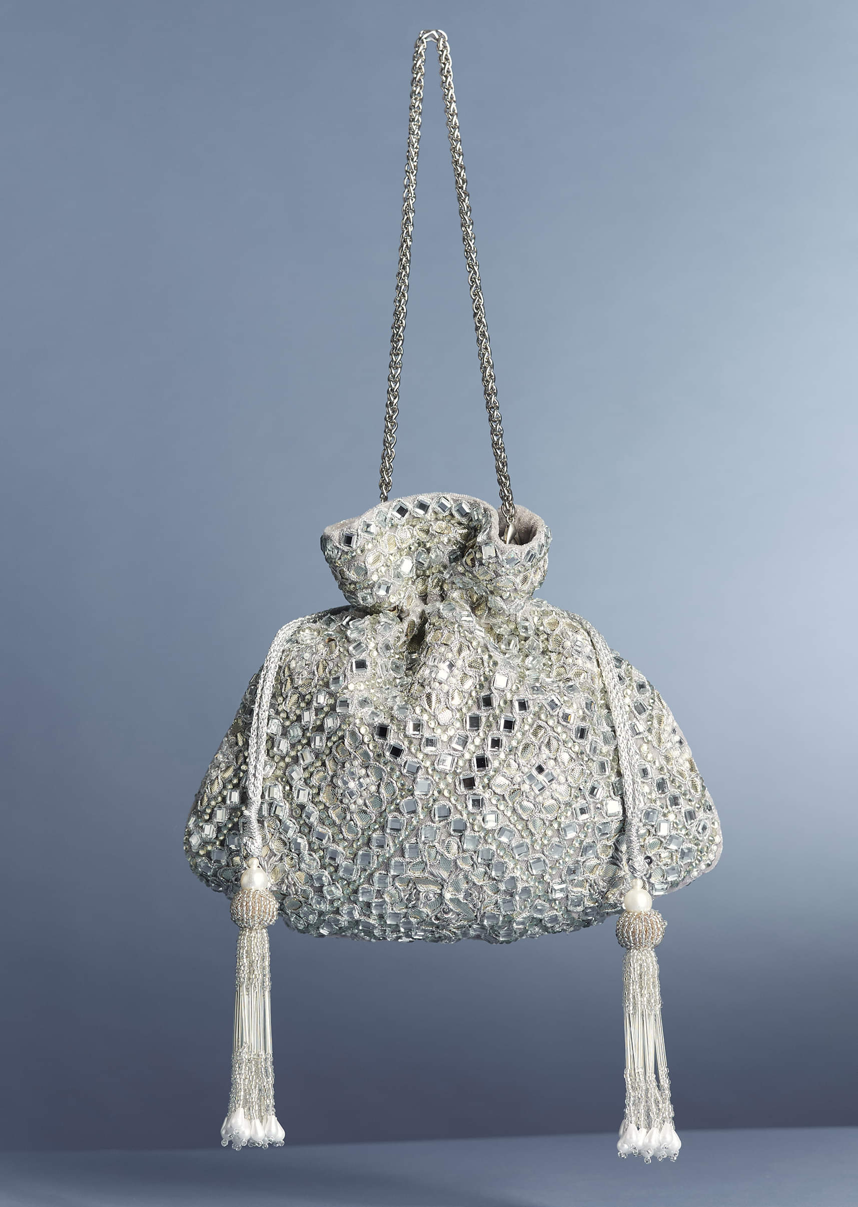 11077-silver-mirror-work-potli-1.jpg Silver Mirror Work Potli