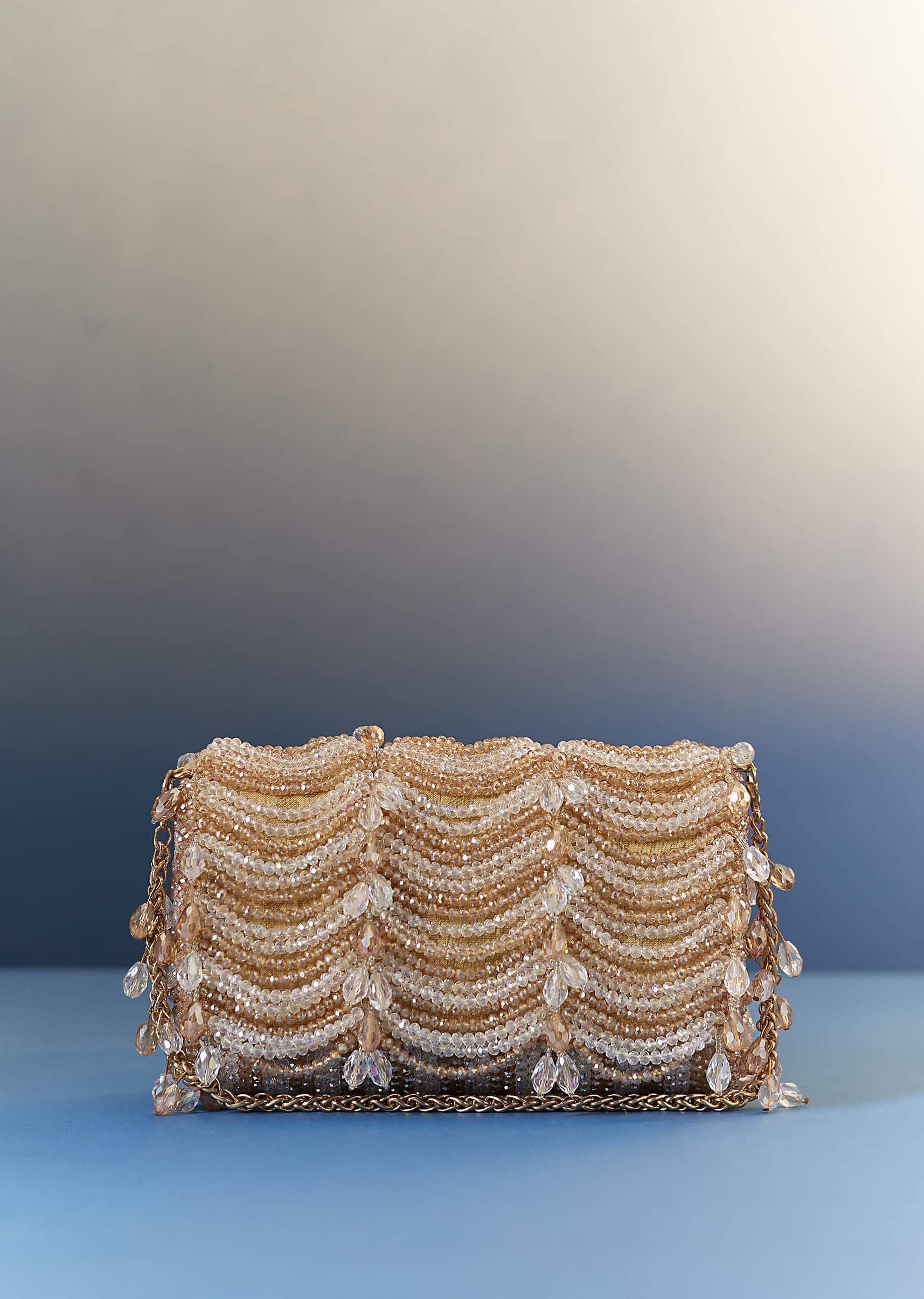 11081-gold-potli-with-beaded-detailing-1.jpg Gold Potli With Beaded Detailing