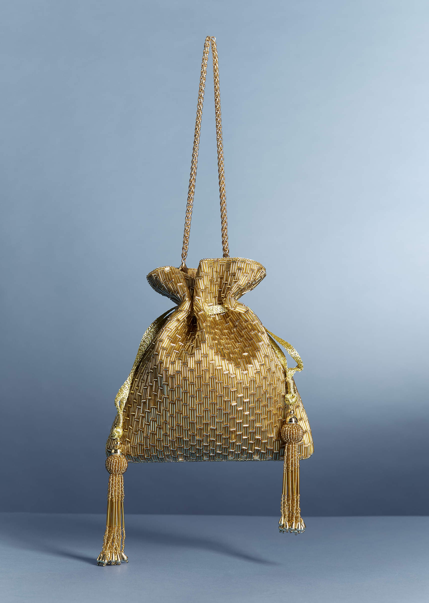 11087-golden-beaded-tassel-potli-1.jpg Golden Beaded Tassel Potli