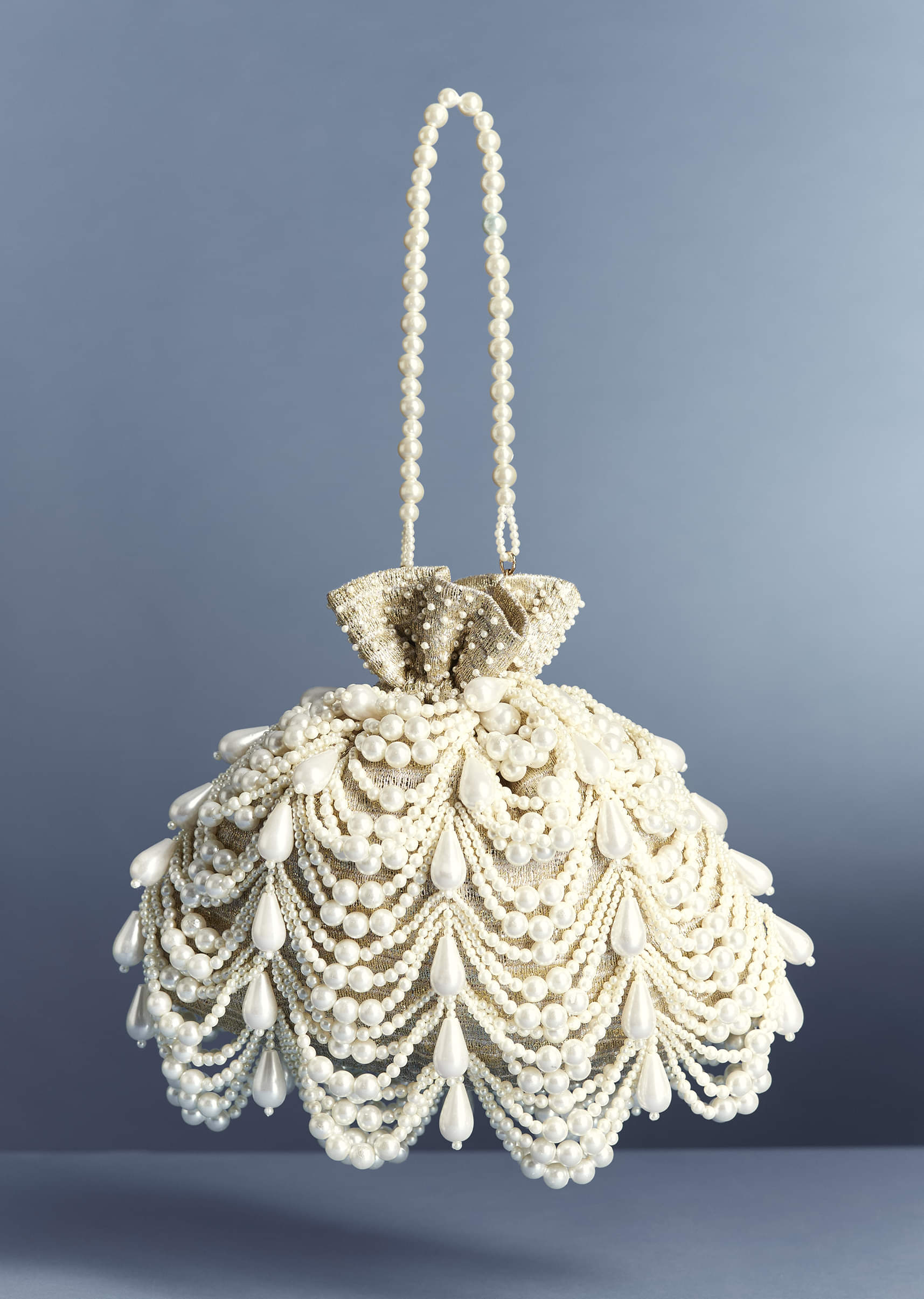 11091-ivory-pearl-drop-potli-1.jpg Ivory Pearl Drop Potli