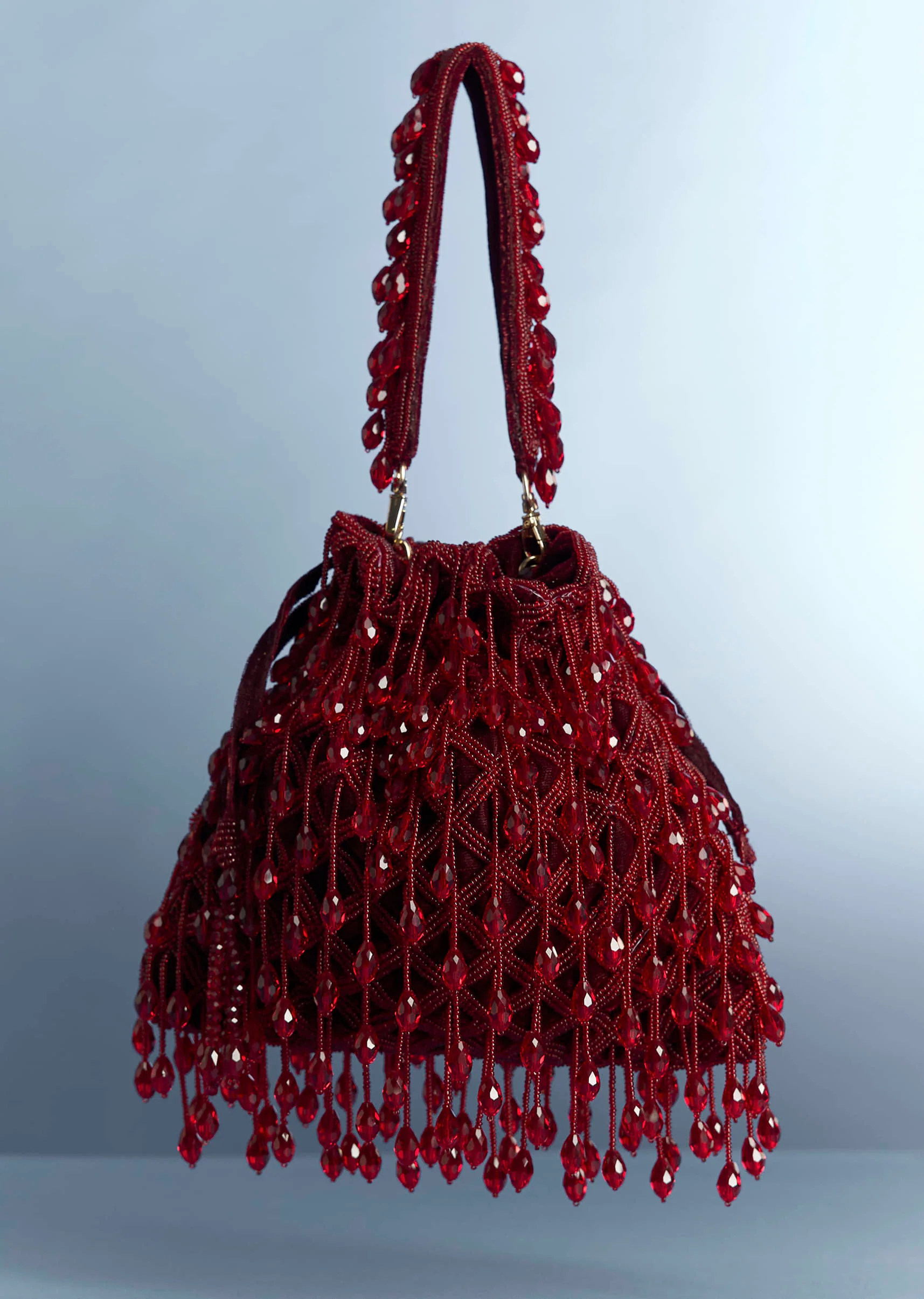 11093-maroon-potli-with-bead-work-1.webp Maroon Potli With Bead Work