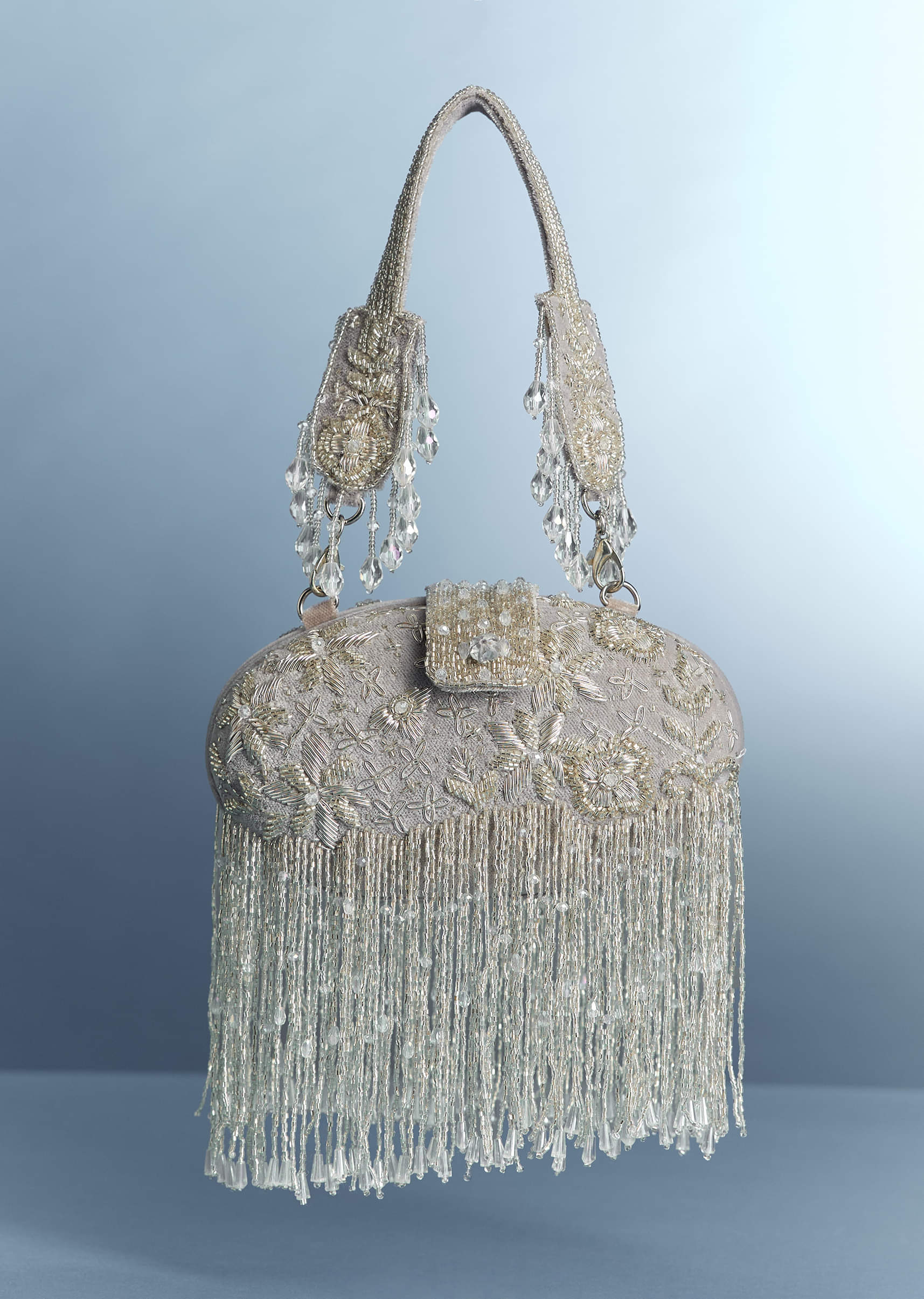11094-silver-potli-with-tassel-detailing-1.jpg Silver Potli With Tassel Detailing
