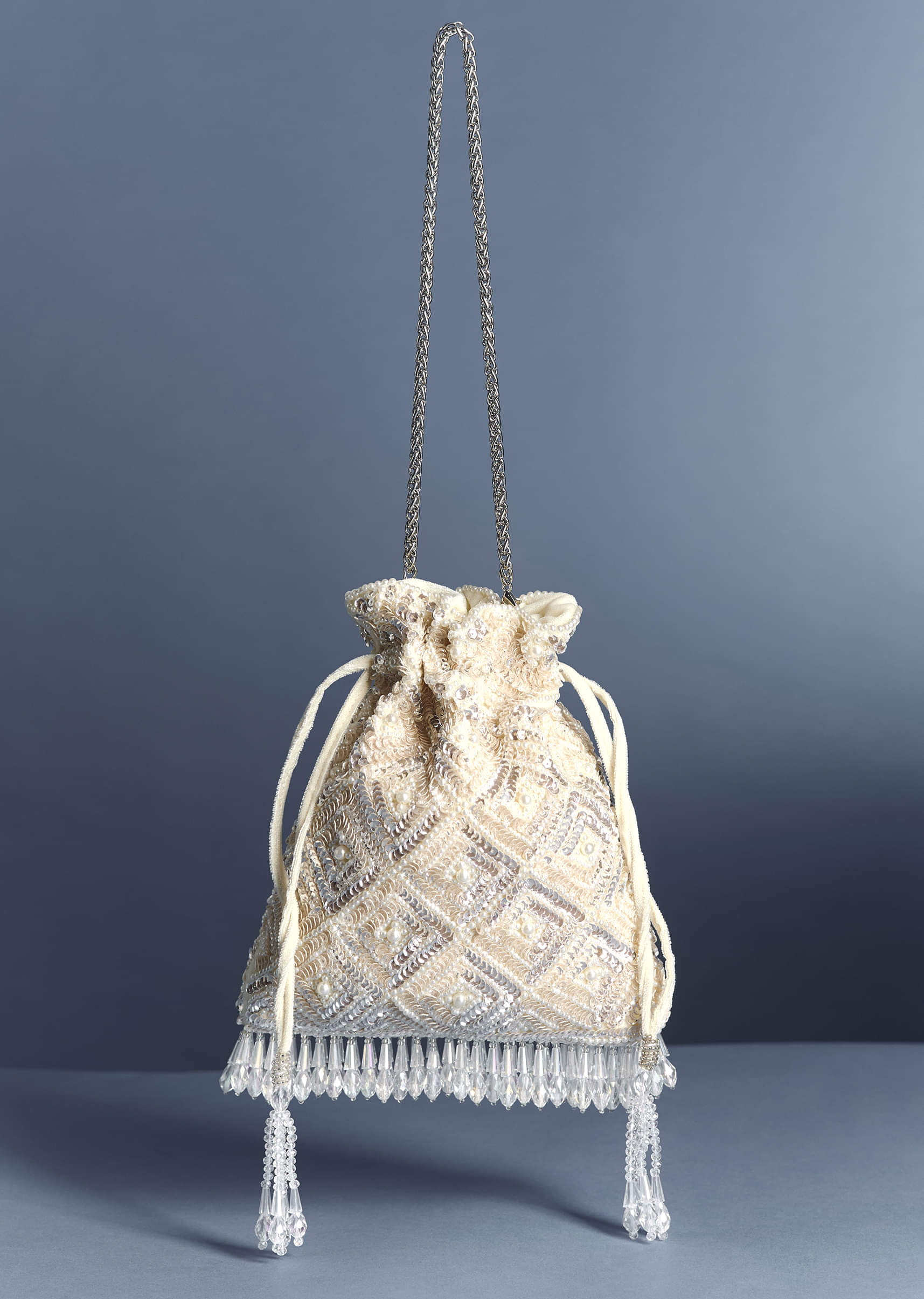 11098-ivory-crystal-fringe-potli-1.jpg Ivory Crystal Fringe Potli