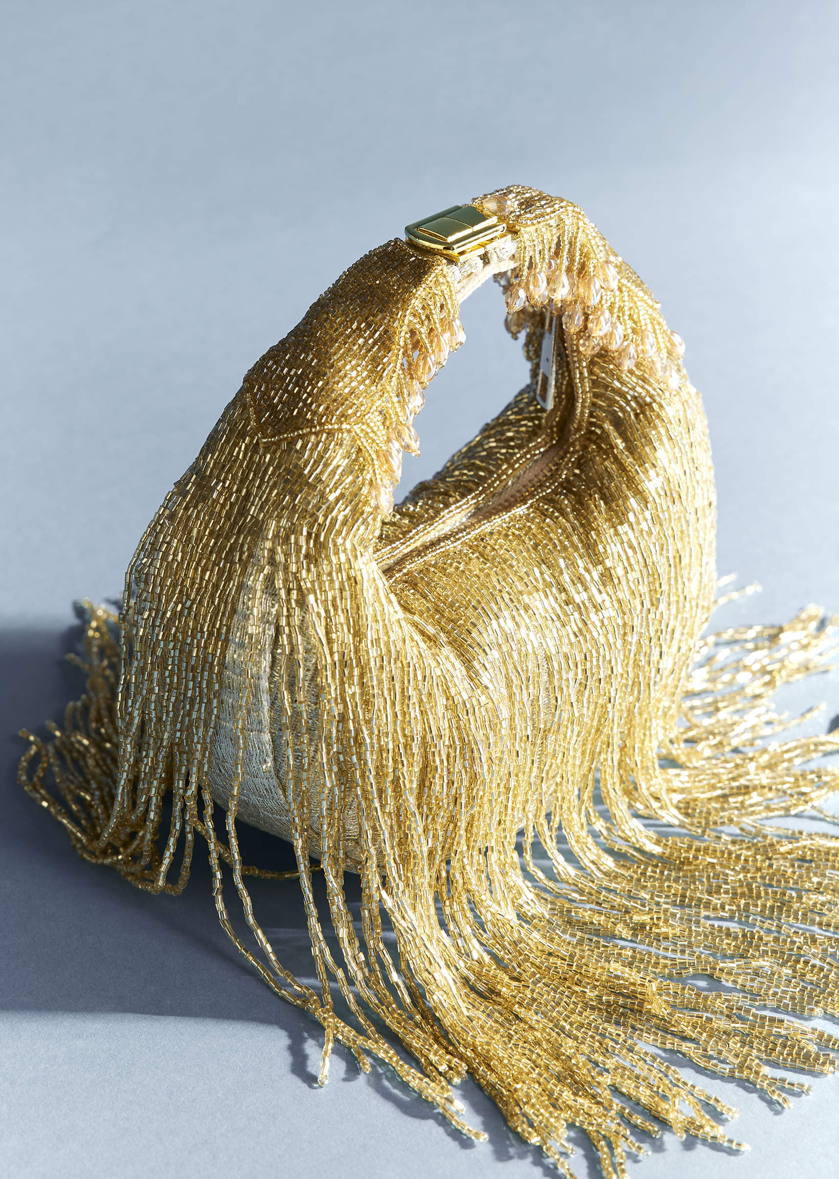 Gold Potli With Tassel Detailing