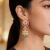 Gold Finish Pink Stone Jhumka Earrings
