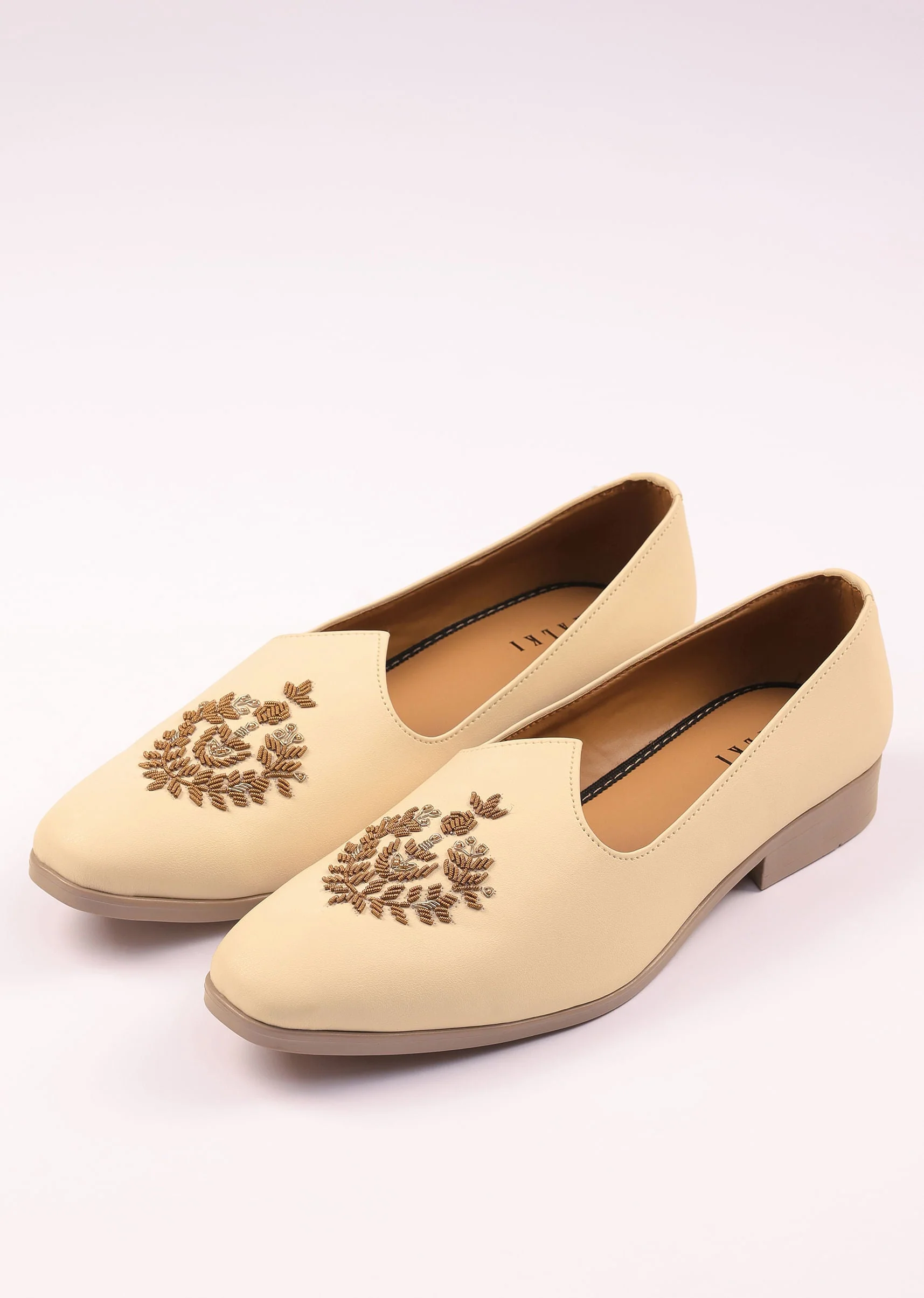 Off White Vegan Leather Jutti With Zardosi Work