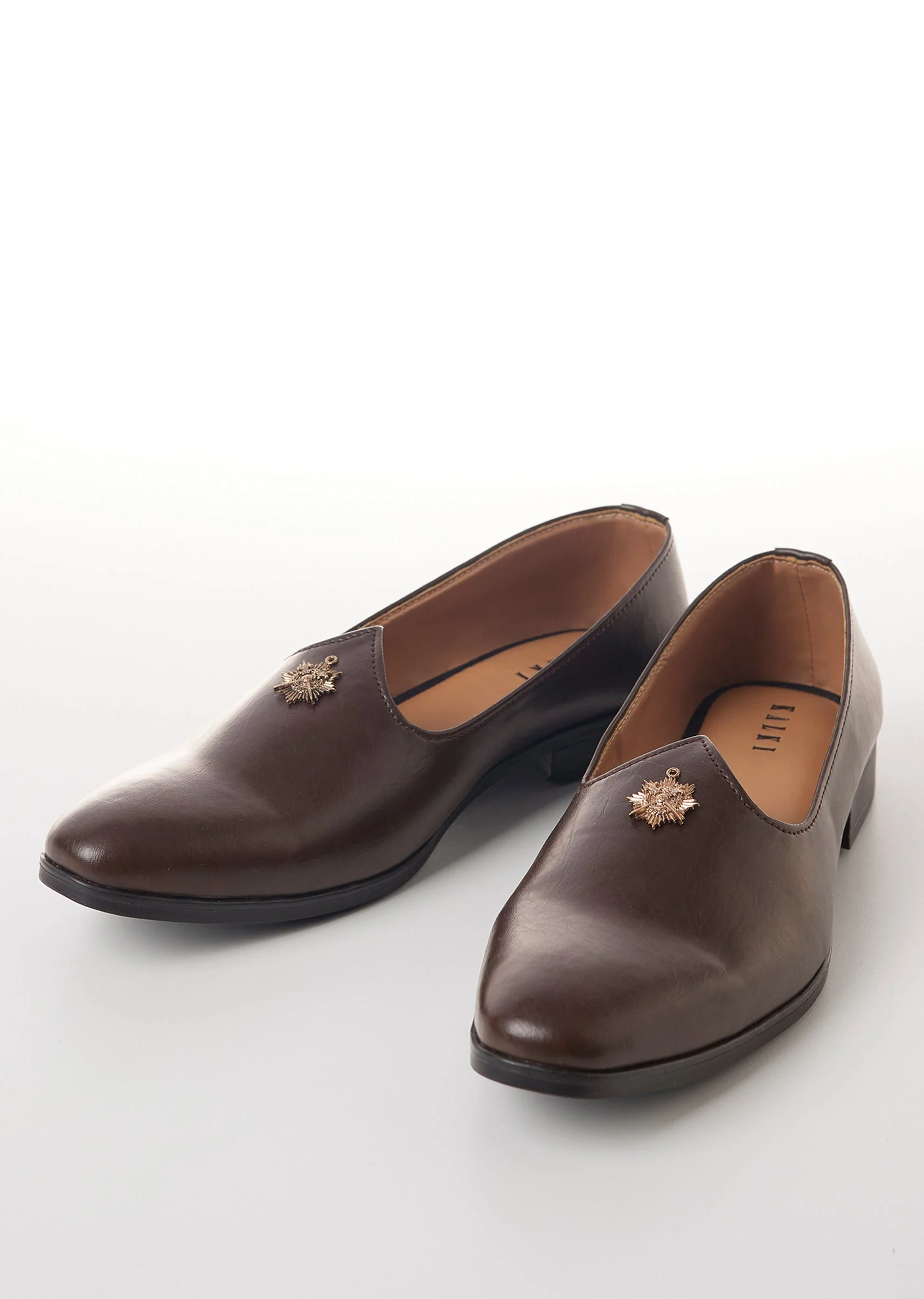 11302-brown-faux-leather-mens-loafers-with-metallic-sunburst-charm-1.webp Brown Faux Leather Mens Loafers with Metallic Sunburst Charm