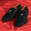 Black Juttis With Tassel Detailing