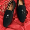 Black Juttis With Tassel Detailing