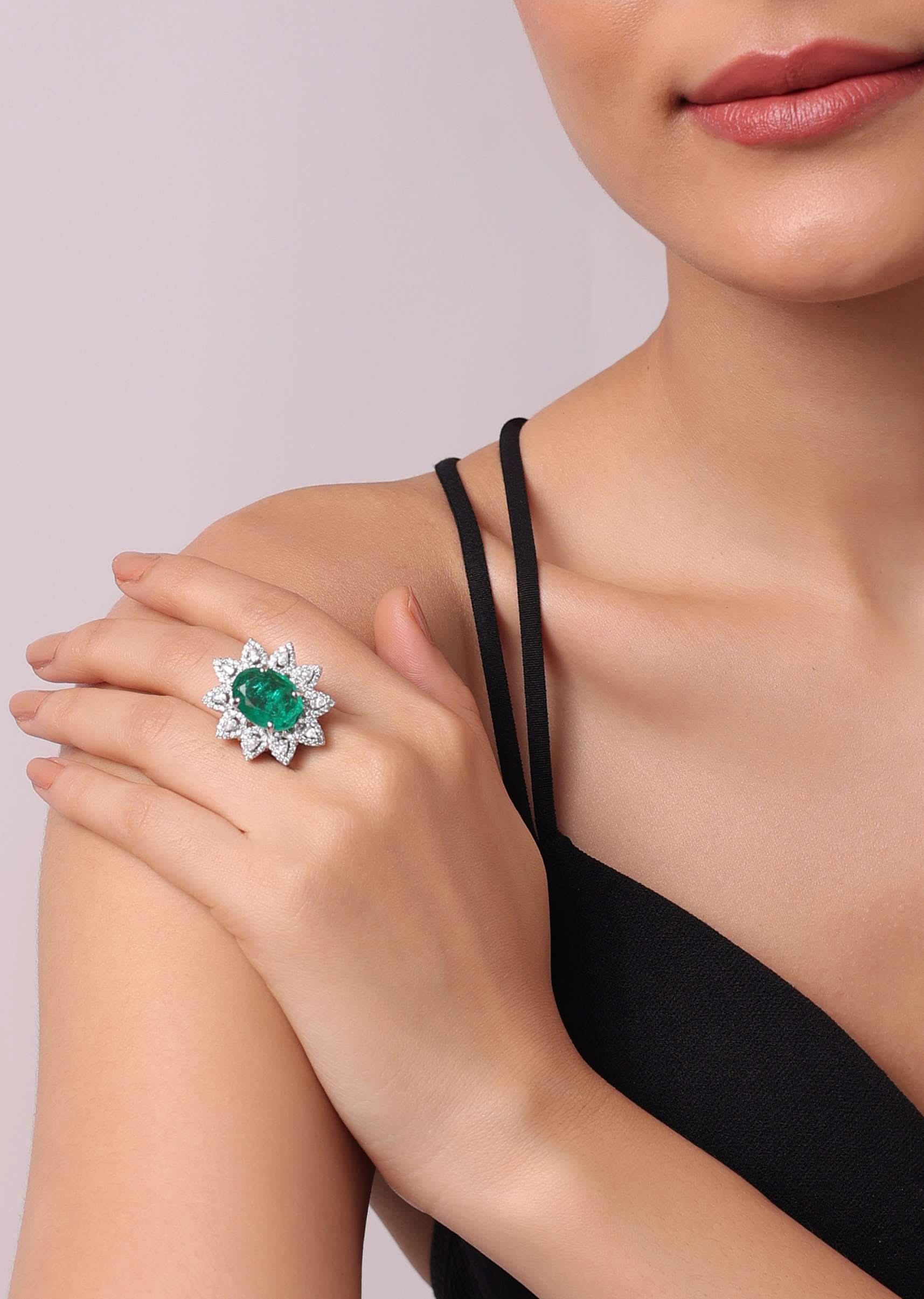1168-92.5-sterling-silver-floral-ring-embedded-with-green-emerald-1.jpg 92.5 Sterling Silver Floral Ring Embedded with Green Emerald
