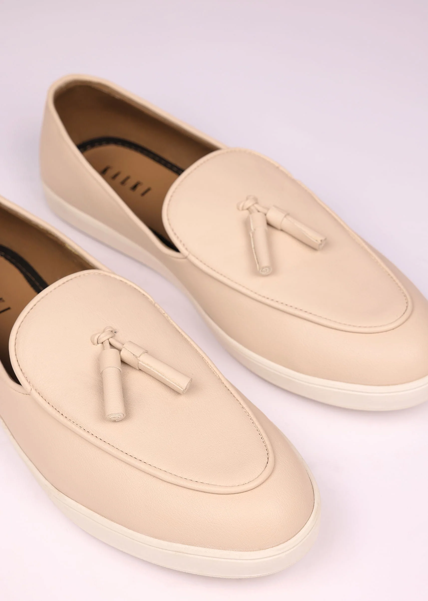 Ivory Vegan Leather Tassel Jutti