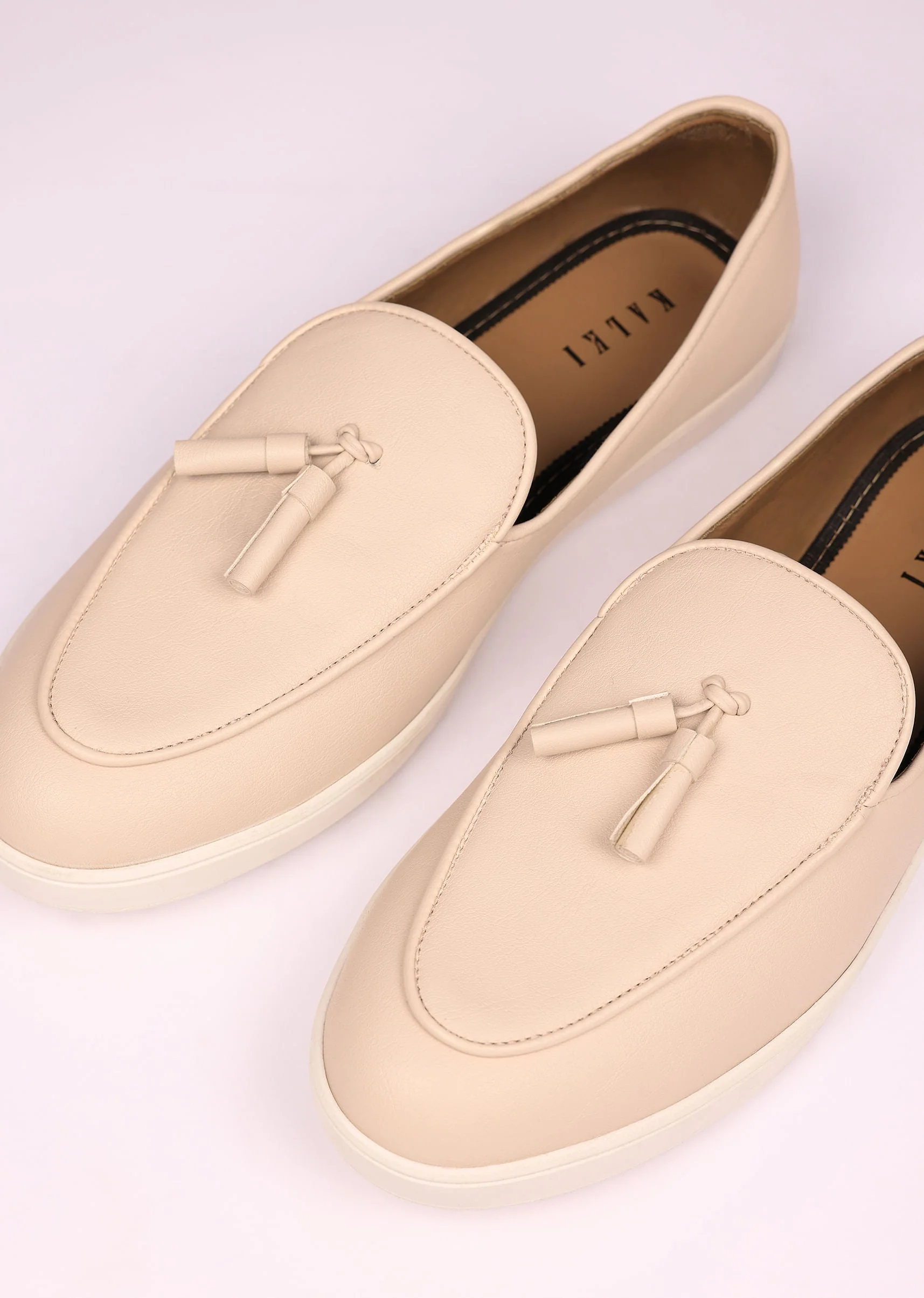 Ivory Vegan Leather Tassel Jutti
