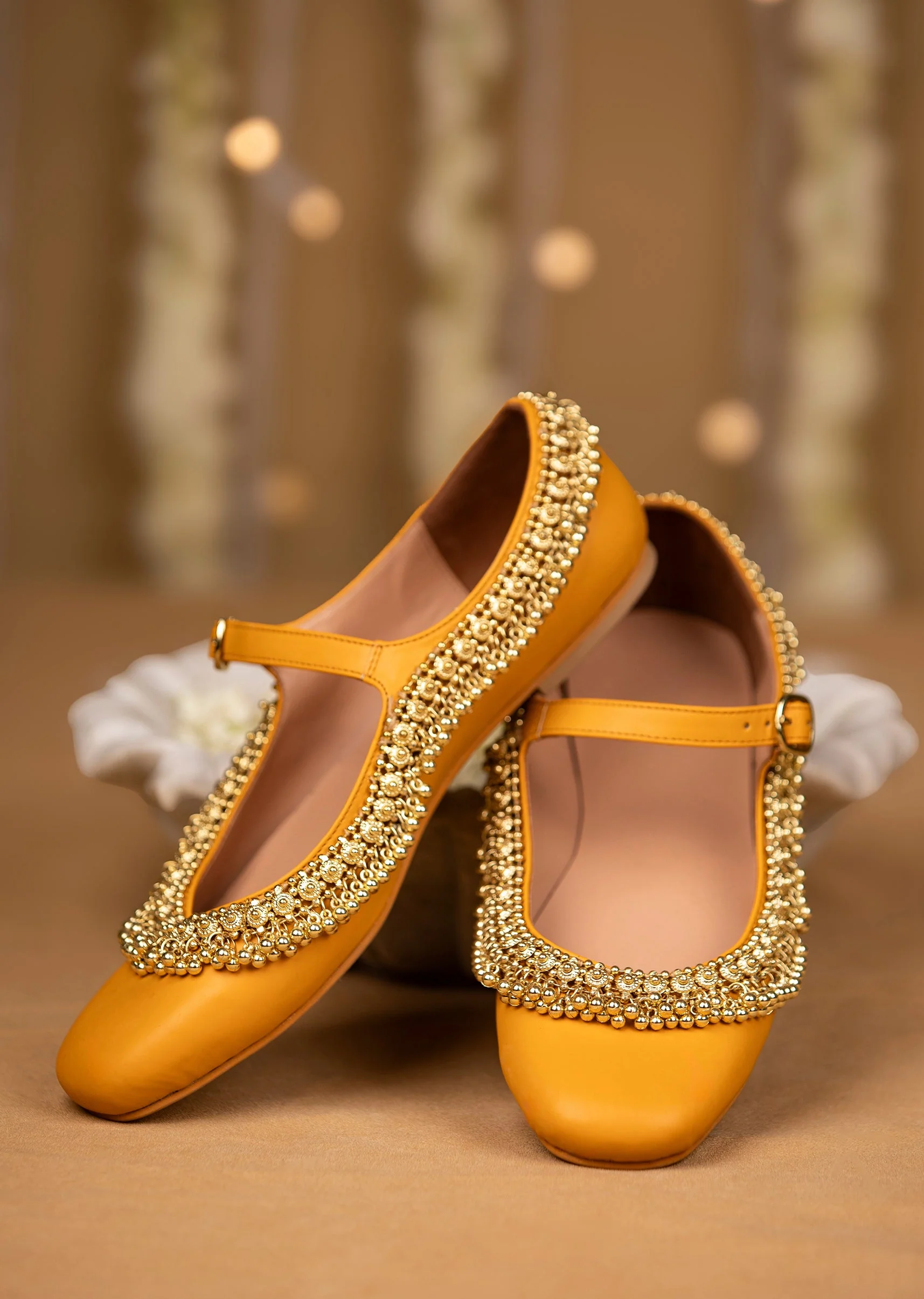 11930-mustard-yellow-faux-leather-bead-embellished-juttis-1.webp Mustard Yellow Faux Leather Bead Embellished Juttis