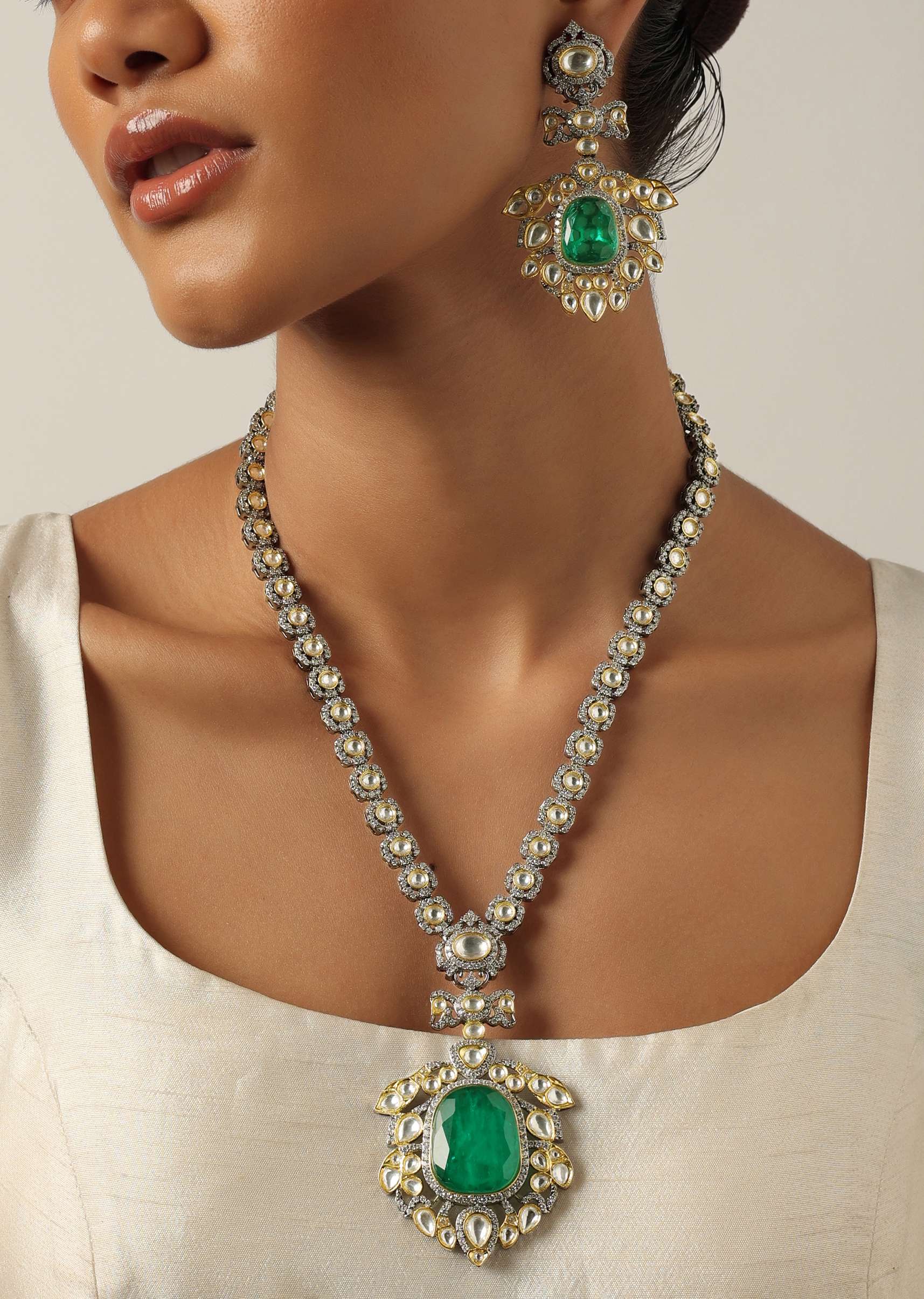 12193-blue-two-tone-polki-long-necklace-set-with-emerald-pendant-1.jpg Blue Two Tone Polki Long Necklace Set With Emerald Pendant