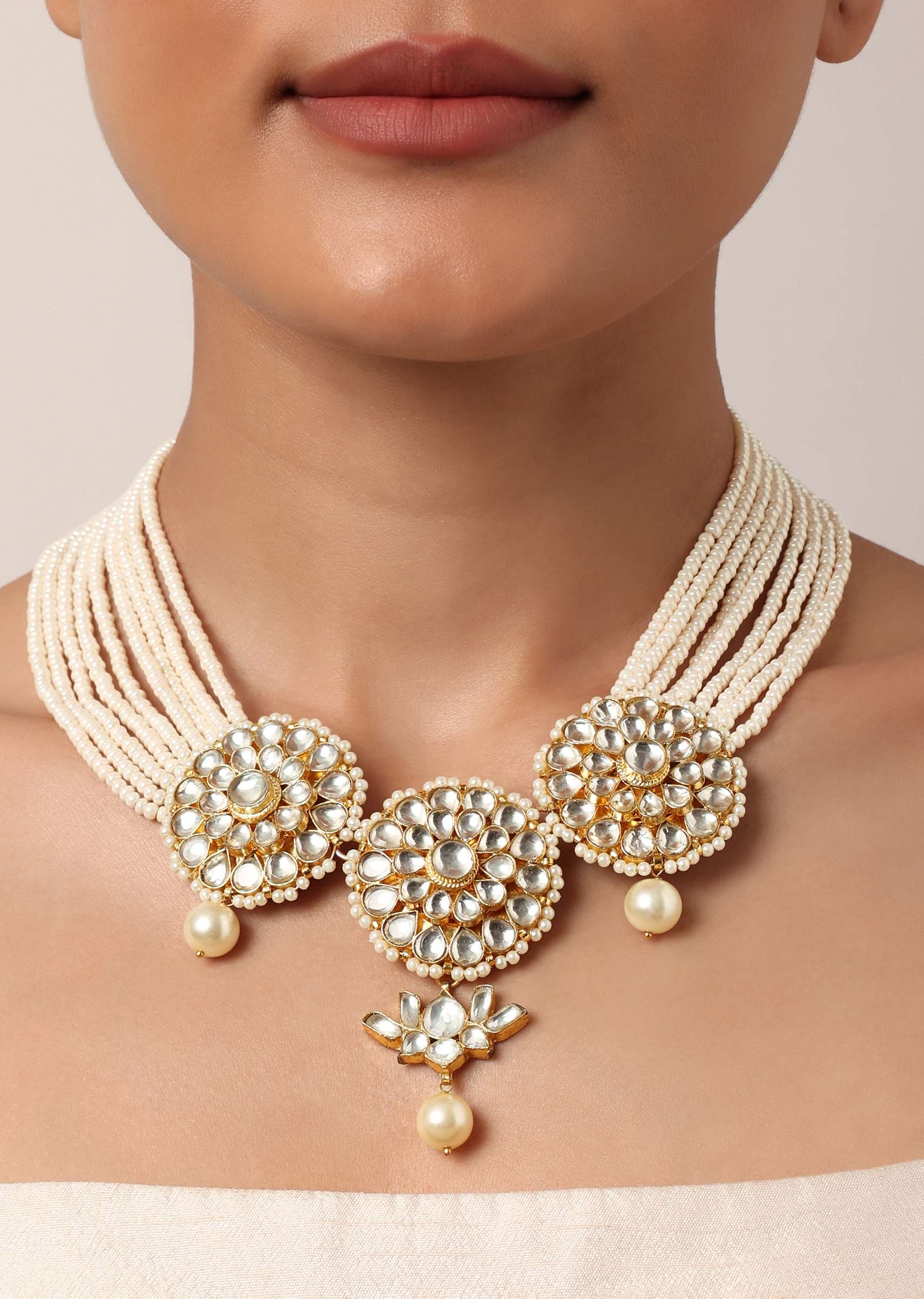 12220-white-necklace-set-with-floral-motif-pendants-3.jpg White Necklace Set With Floral Motif Pendants
