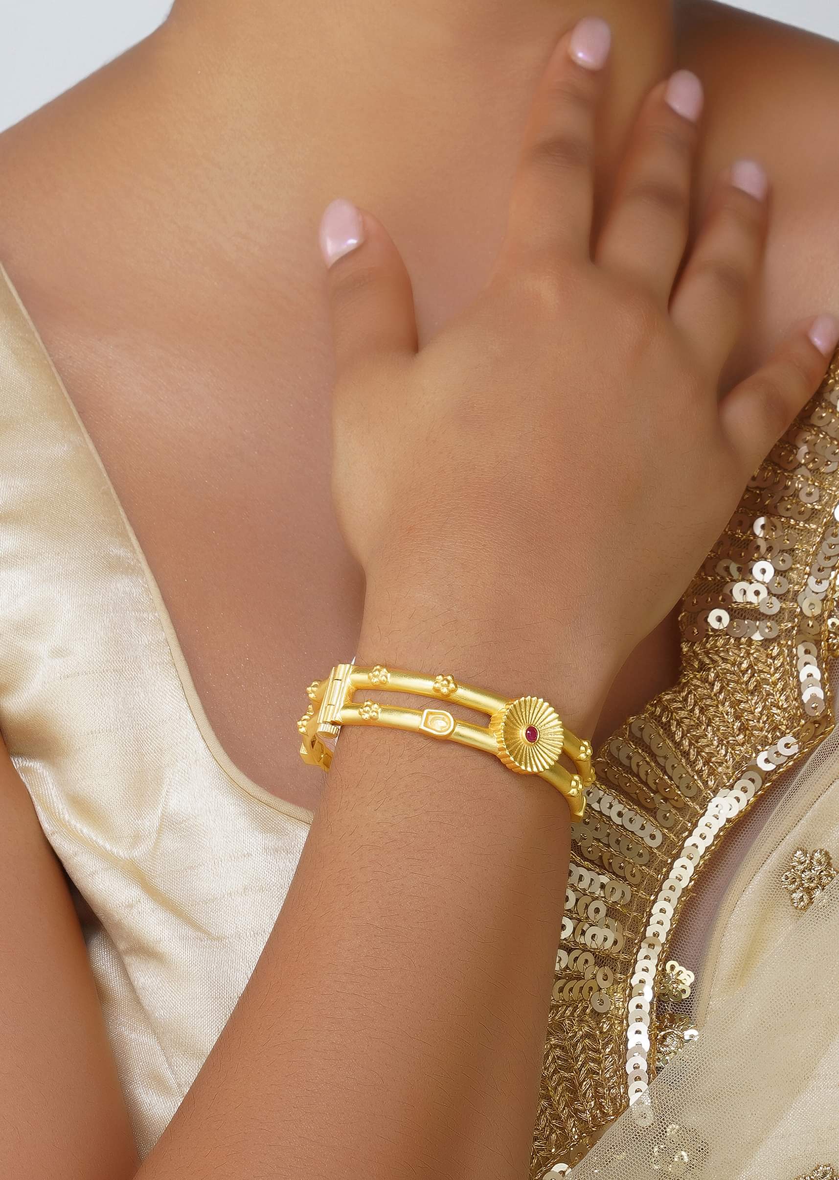 12230-antique-gold-bangle-with-motifs-and-zircon-details-1.jpg Antique Gold Bangle With Motifs And Zircon Details