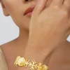 12233-antique-gold-bangle-with-ornamental-motifs-1.webp Antique Gold Bangle With Ornamental Motifs
