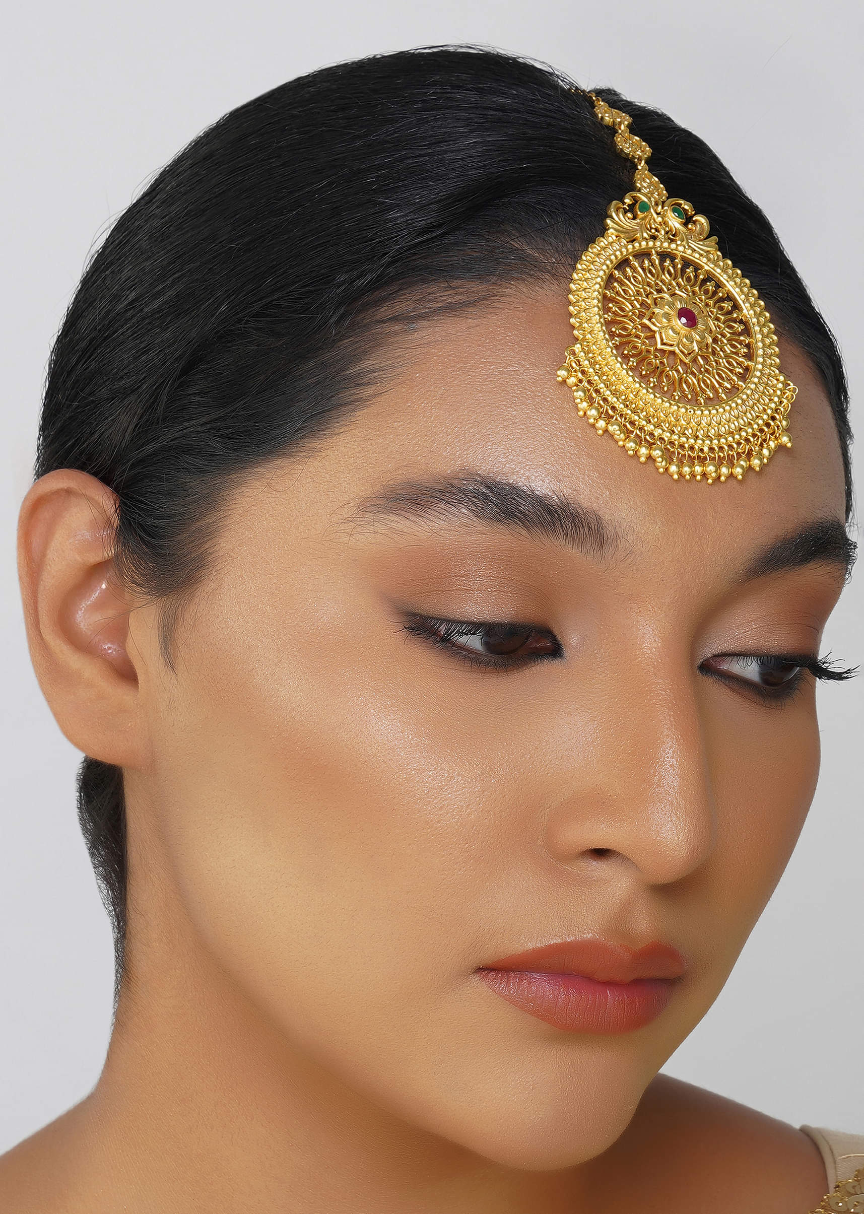 12243-antique-gold-maang-tikka-with-zircon-accents-1.jpg Antique Gold Maang Tikka With Zircon Accents