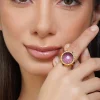 12250-gold-navratna-ring-with-purple-stone-accent-1.webp Gold Navratna Ring With Purple Stone Accent