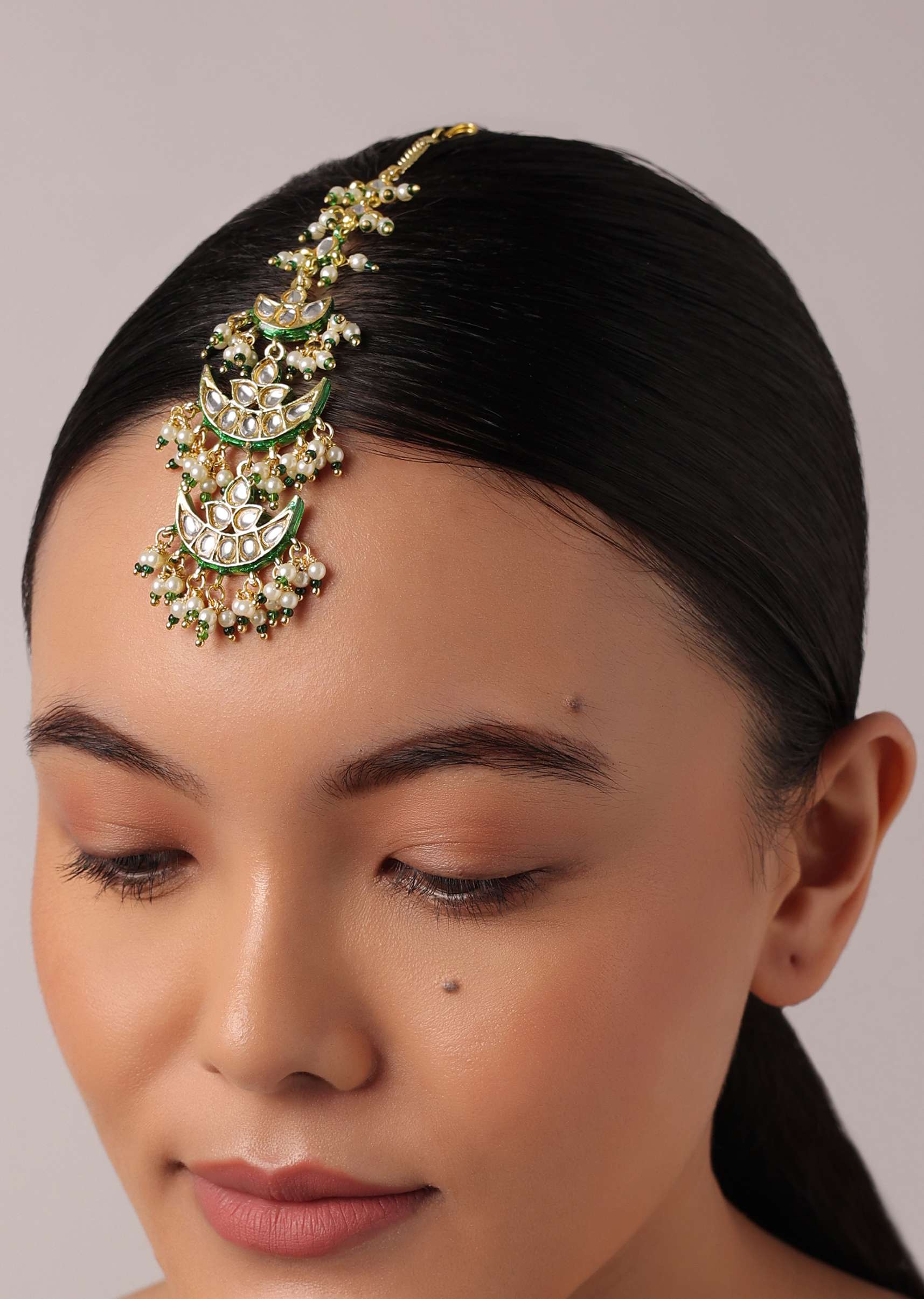 12264-green-tiered-maangtikka-with-studded-kundan-and-crescent-moon-motifs-2.jpg Green Tiered Maangtikka With Studded Kundan And Crescent Moon Motifs