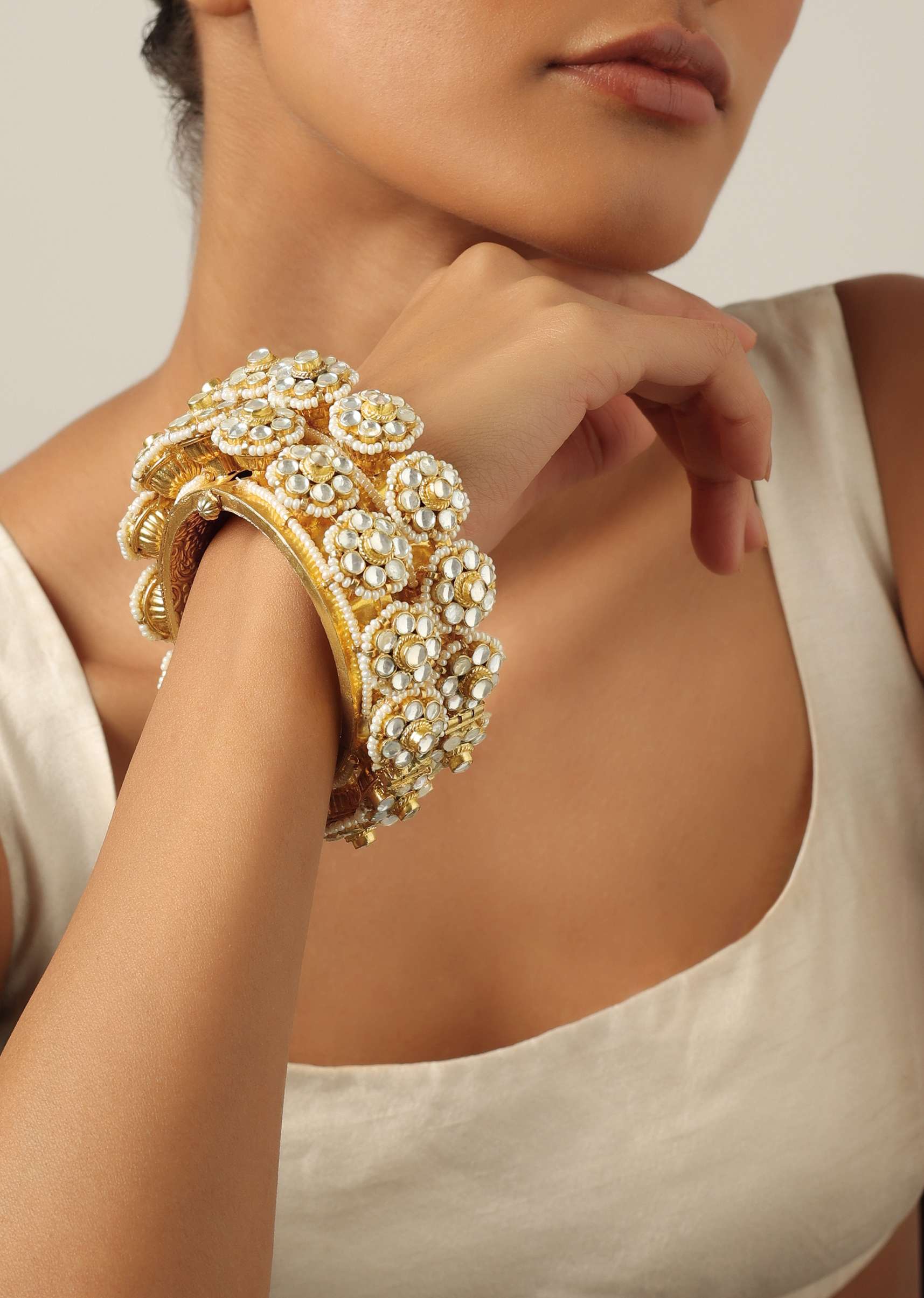 12269-gold-tone-kundan-bangle-with-pearls-and-floral-motifs-2.jpg Gold Tone Kundan Bangle With Pearls And Floral Motifs