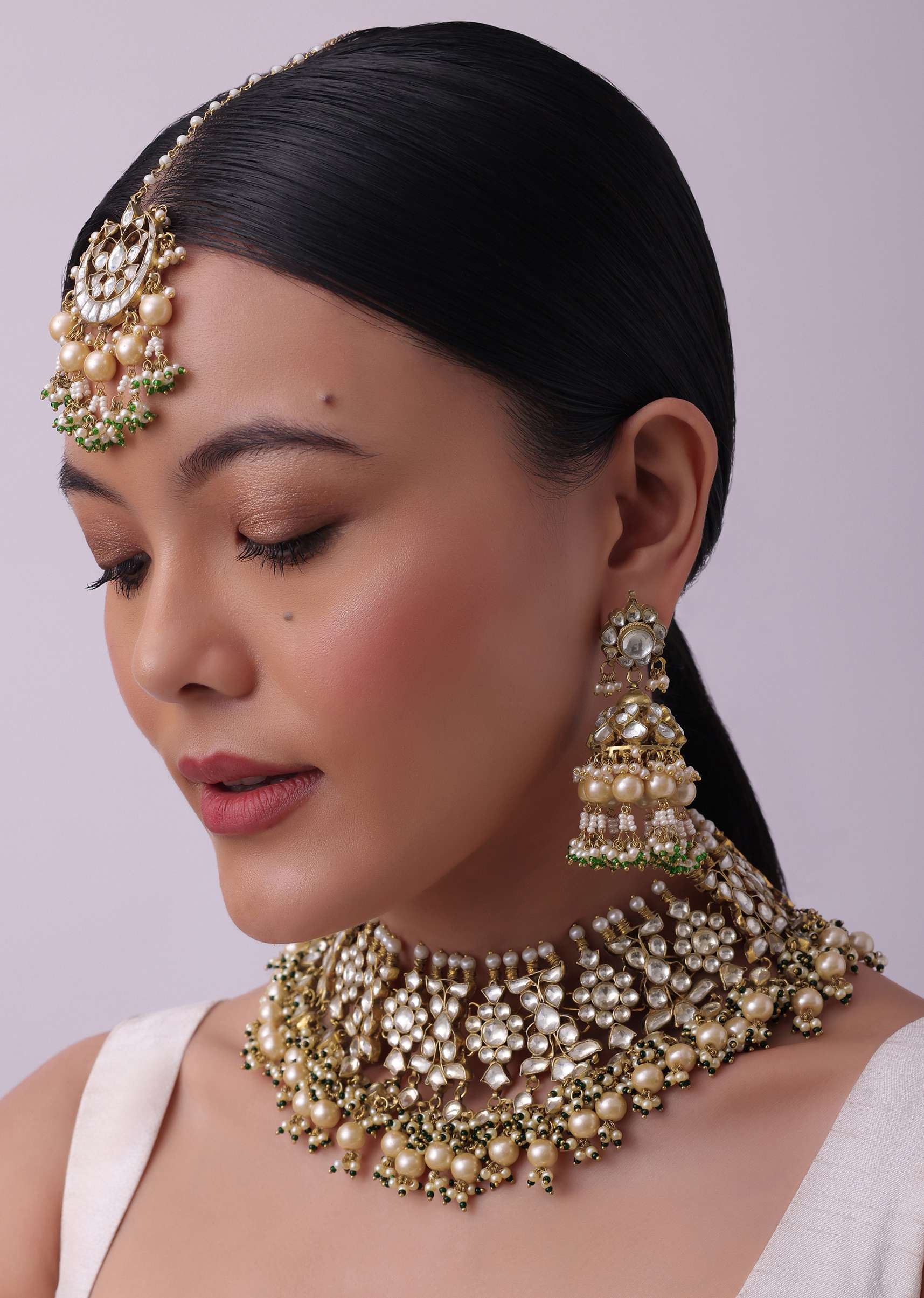 12273-gold-finish-heavy-bridal-choker-and-maang-tikka-set-1.jpg Gold Finish Heavy Bridal Choker And Maang Tikka Set