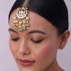12273-gold-finish-heavy-bridal-choker-and-maang-tikka-set-3.jpg Gold Finish Heavy Bridal Choker And Maang Tikka Set