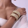 12280-gold-finish-kundan-bangles-in-mix-metal-2.jpg Gold Finish Kundan Bangles In Mix Metal