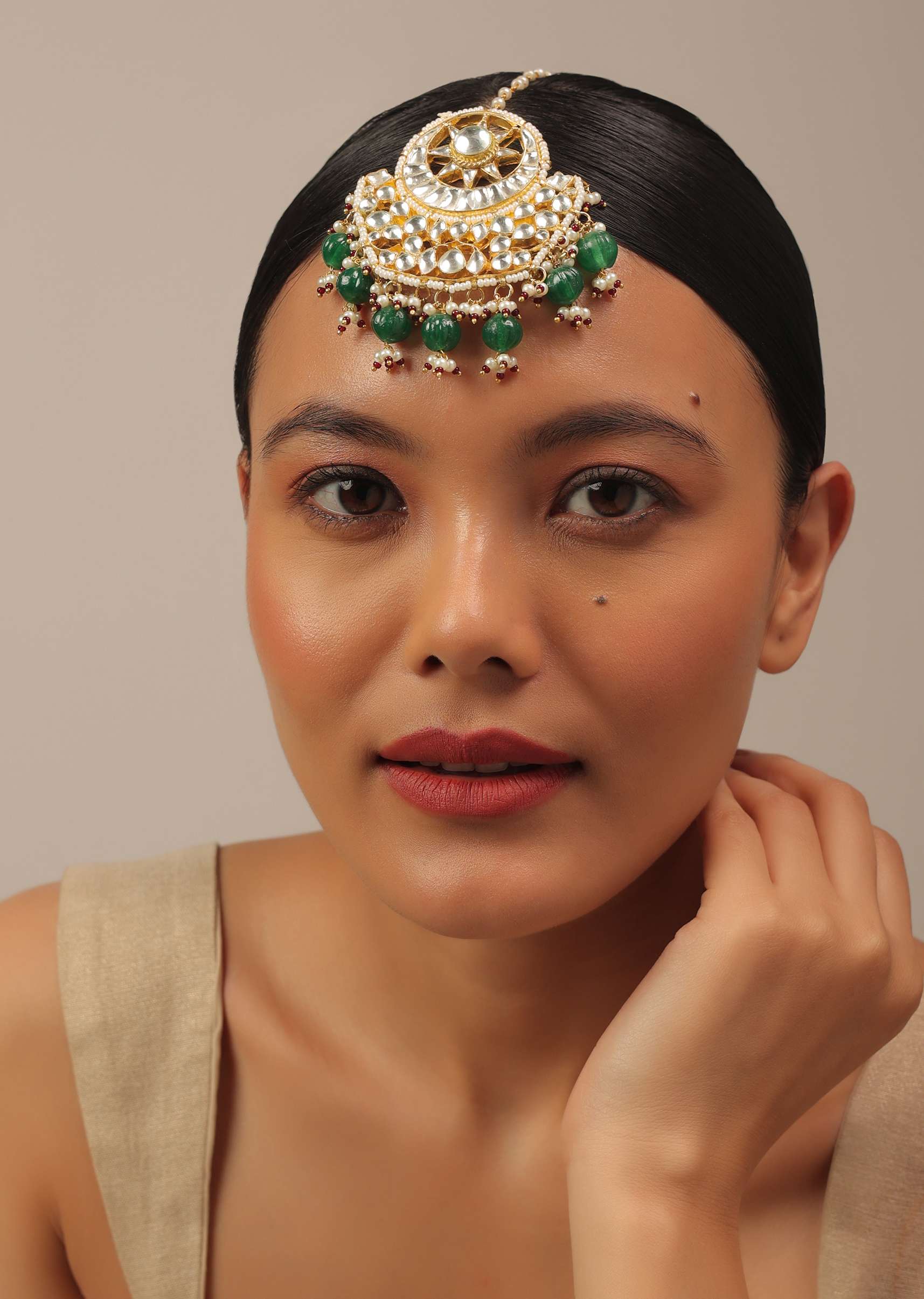 12287-gold-finish-kundan-floral-maangtika-with-synthetic-emerald-stones-and-beads-1.jpg Gold Finish Kundan Floral Maangtika With Synthetic Emerald Stones And Beads