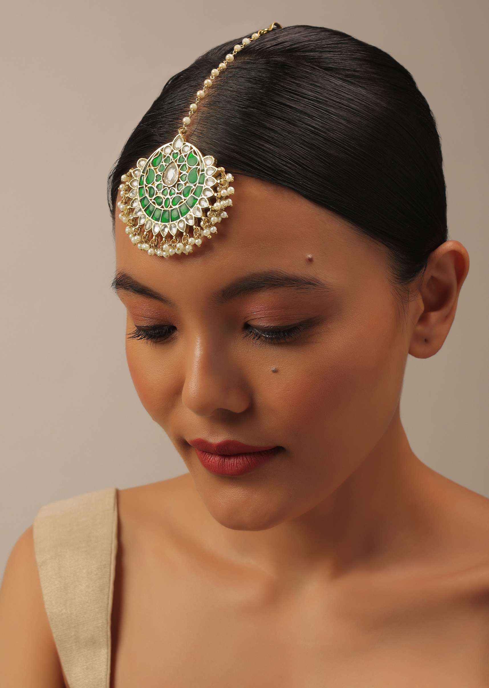 12290-gold-finish-kundan-maangteeka-with-synthetic-emerald-stones-and-beads-1.jpg Gold Finish Kundan Maangteeka With Synthetic Emerald Stones And Beads