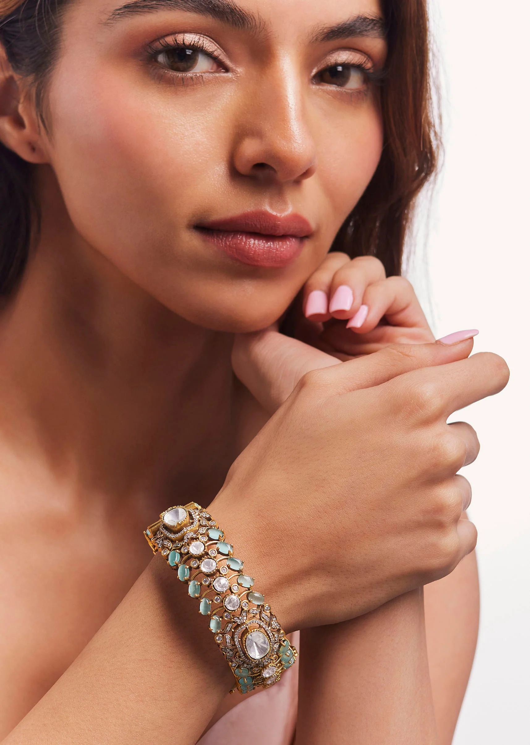 12414-gold-finish-zircon-and-aqua-stone-bangle-1.webp Gold Finish Zircon And Aqua Stone Bangle