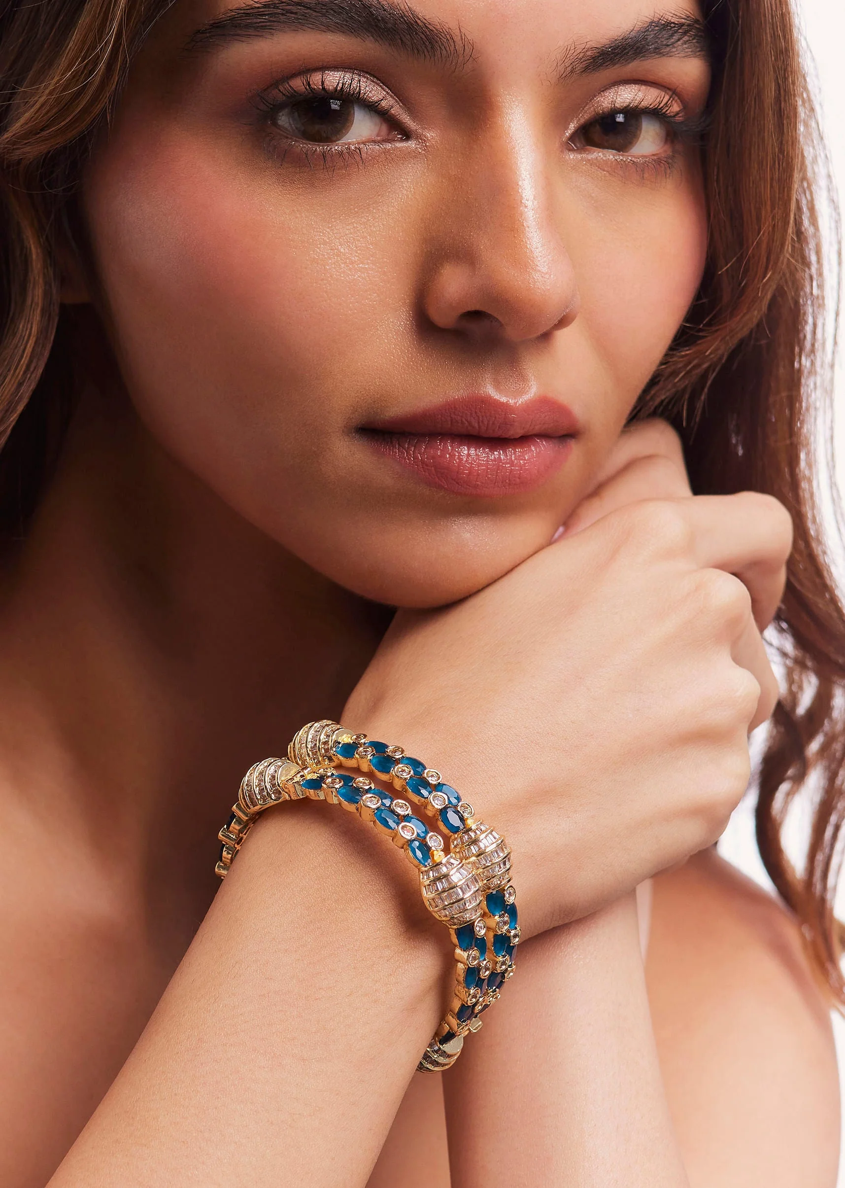 12483-gold-finish-emerald-synthetic-stone-bangles-1.webp Gold Finish Emerald Synthetic Stone Bangles