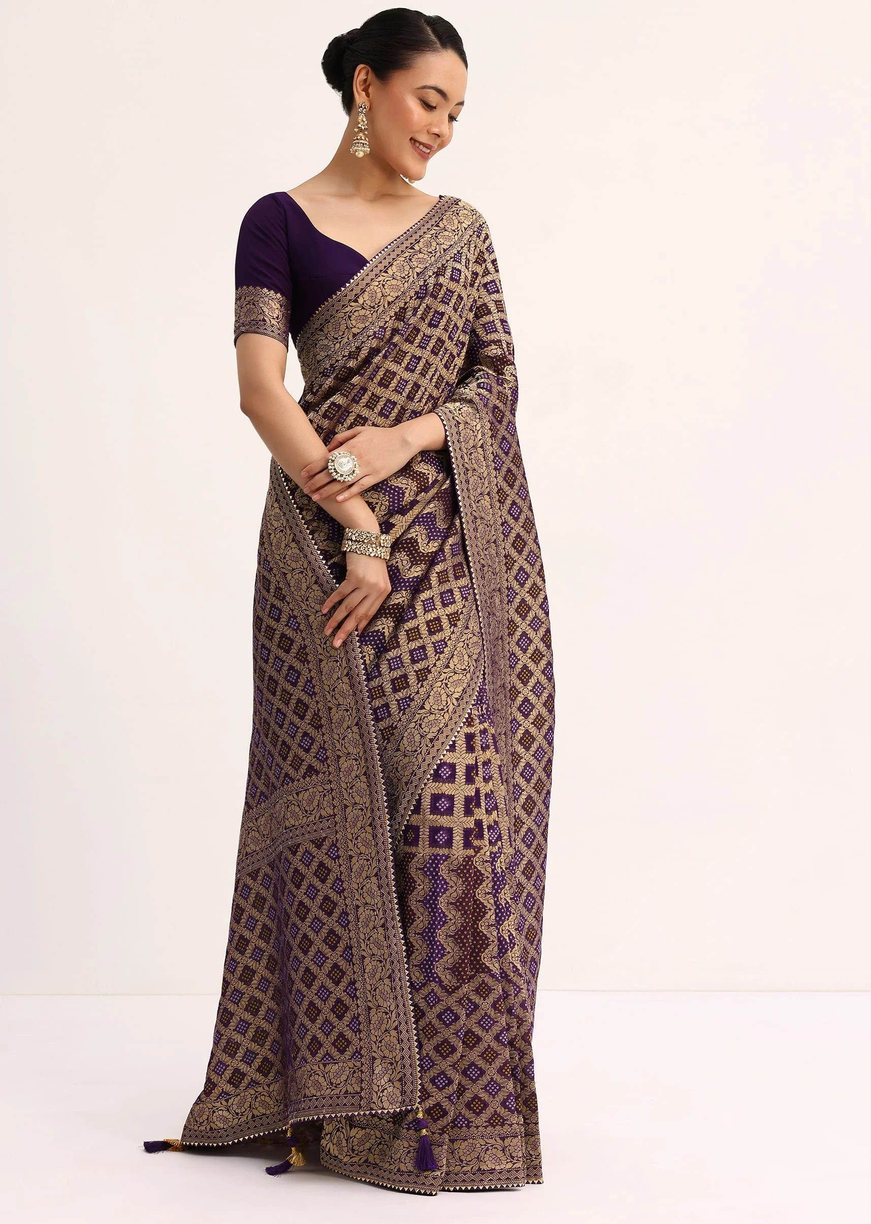 12663-purple-bandhani-tie-dye-saree-with-zari-jaal-and-unstitched-blouse-1.webp Purple Bandhani Tie Dye Saree With Zari Jaal And Unstitched Blouse