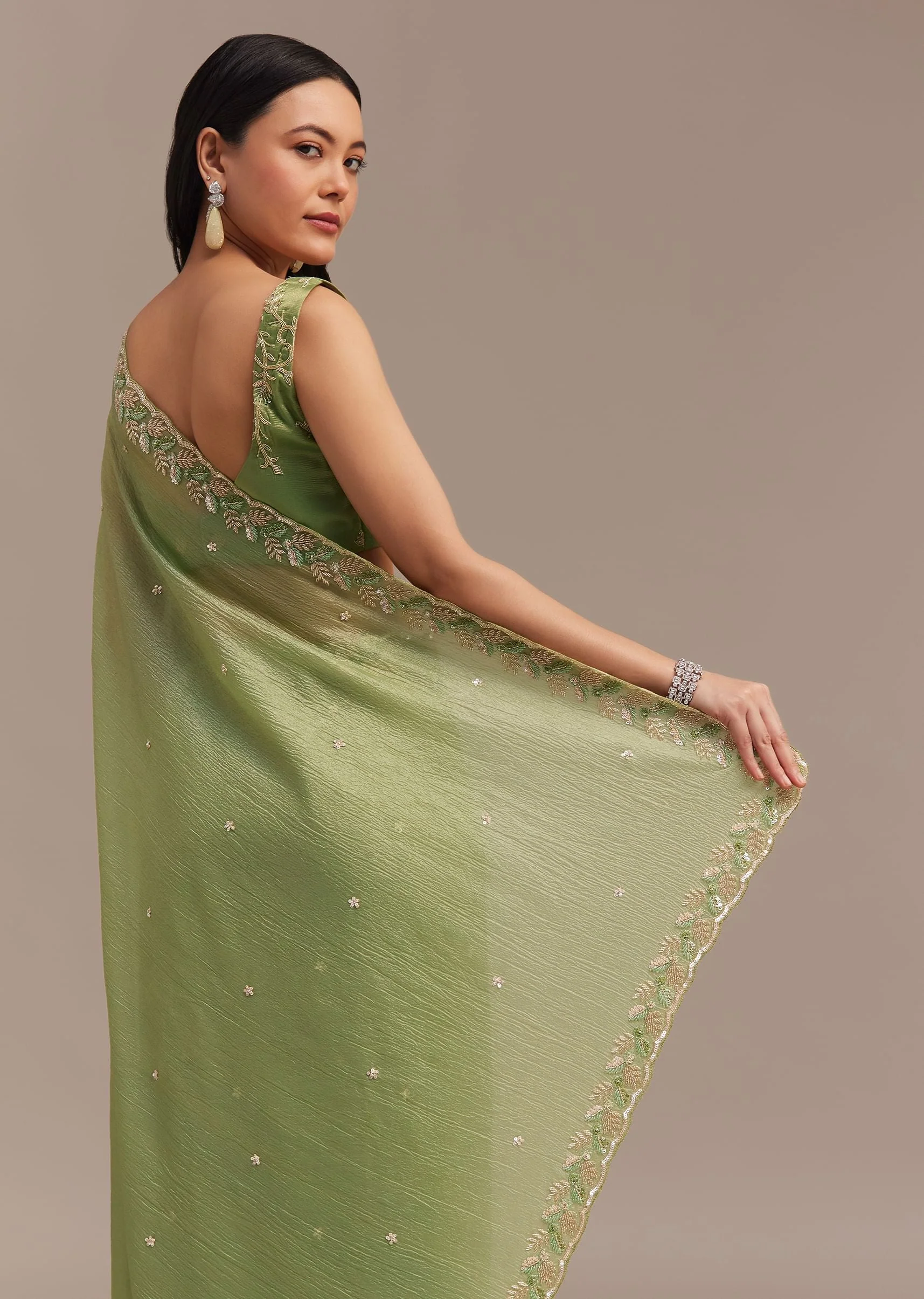 Parrot Green Crushed Tissue Saree With Sequins And Scallop Border