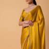 Mustard Satin Chinnon Saree With Mirror Detail Border And Unstitched Blouse Piece