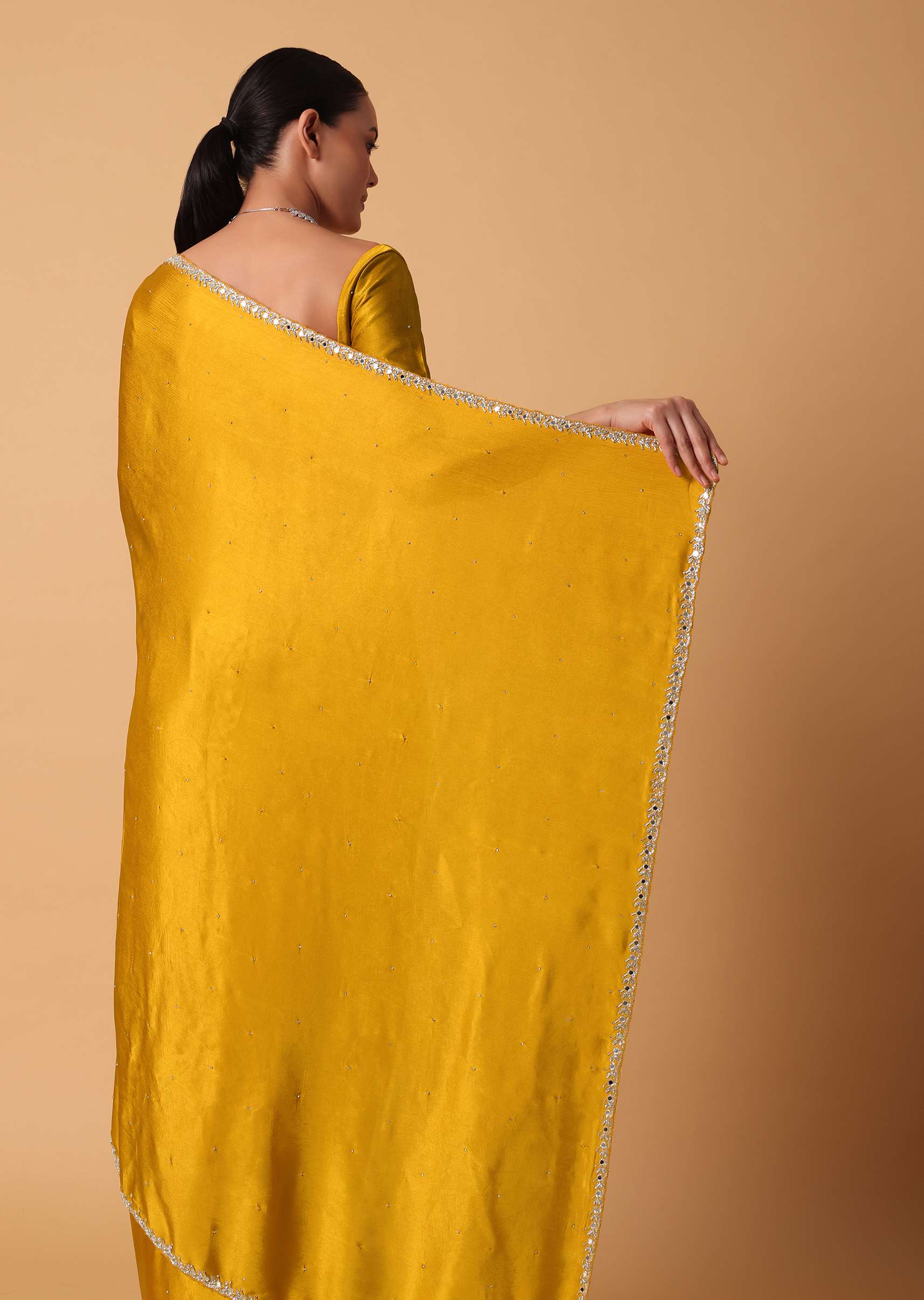 Mustard Satin Chinnon Saree With Mirror Detail Border And Unstitched Blouse Piece
