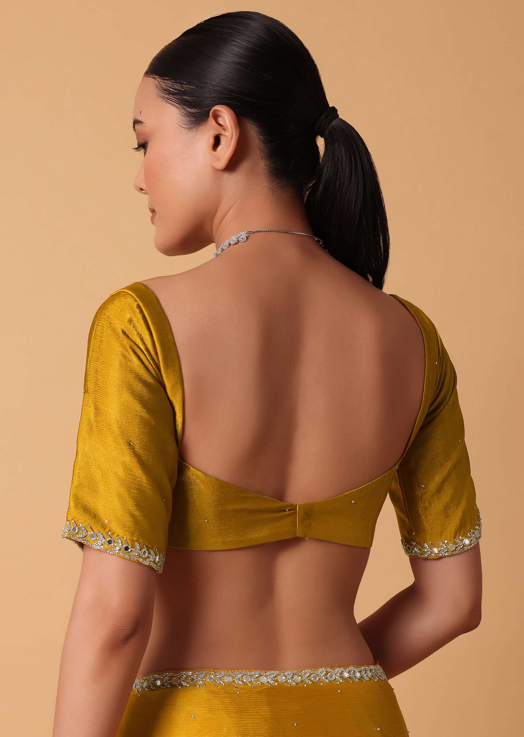 Mustard Satin Chinnon Saree With Mirror Detail Border And Unstitched Blouse Piece
