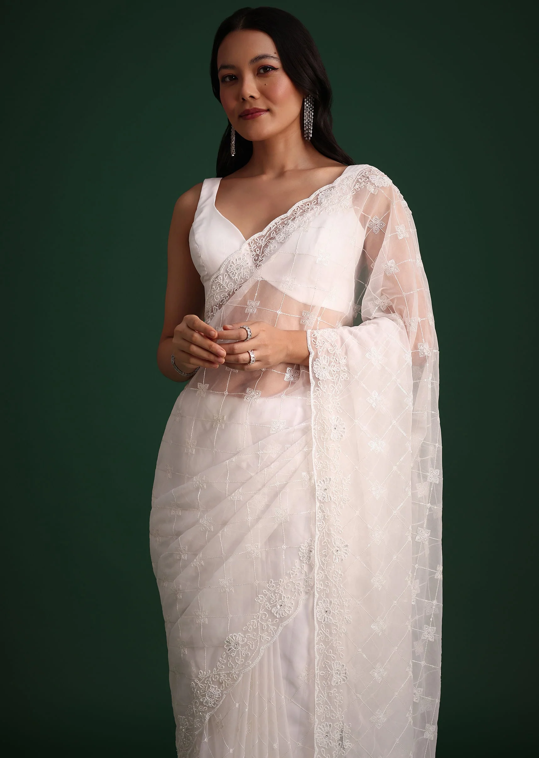 13244-white-organza-saree-with-cutdana-and-sequin-embroidery-1.webp White Organza Saree With Cutdana And Sequin Embroidery