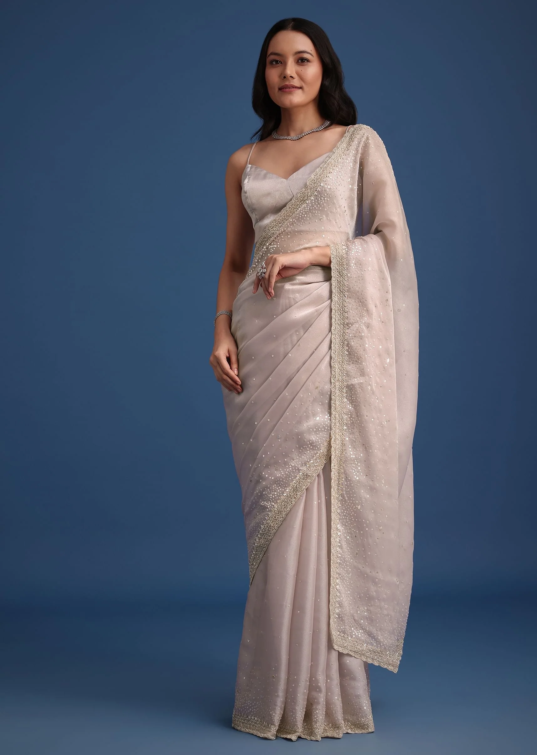 13388-grey-glass-tissue-silk-cutdana-work-saree-with-embellished-scallop-border-1.webp Grey Glass Tissue Silk Cutdana Work Saree With Embellished Scallop Border